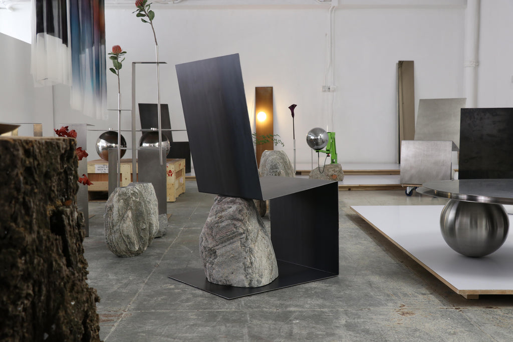 https://a.1stdibscdn.com/steel-and-stone-chair-by-batten-and-kamp-for-sale-picture-19/f_12192/f_319184621704910739311/Steel_and_Stone_lounge_chair_hot_rolled_Edition_4_F_master.jpg