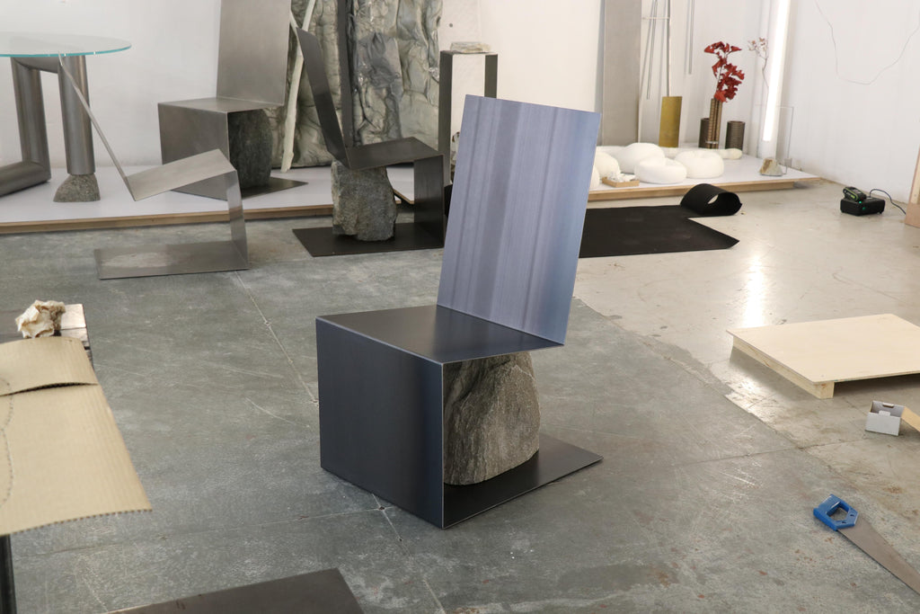 https://a.1stdibscdn.com/steel-and-stone-chair-by-batten-and-kamp-for-sale-picture-20/f_12192/f_319184621704910739367/Steel_and_Stone_lounge_chair_hot_rolled_Edition_4_G_master.JPG