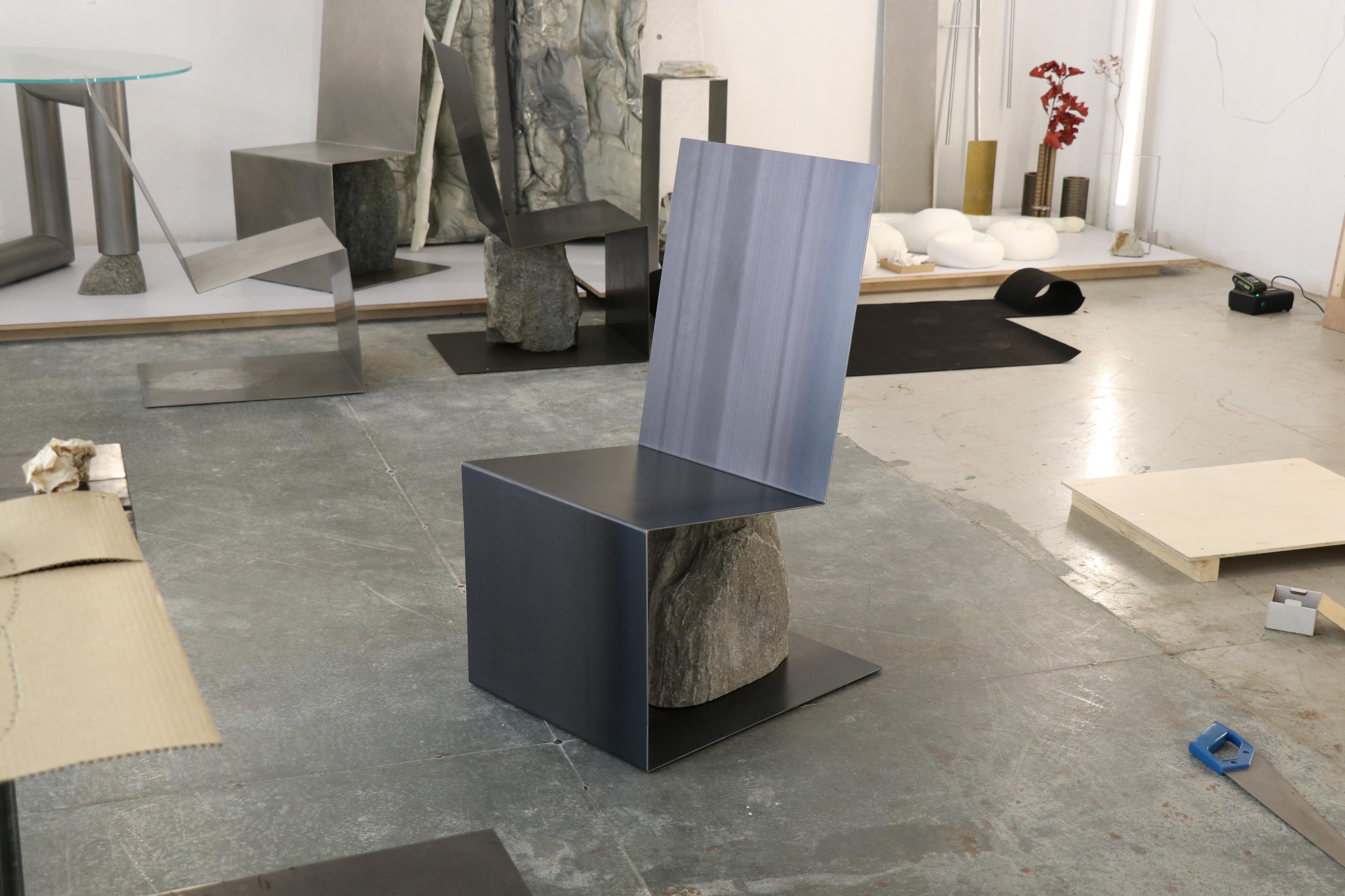 https://a.1stdibscdn.com/steel-and-stone-chair-by-batten-and-kamp-for-sale-picture-20/f_12192/f_319184621704910739367/Steel_and_Stone_lounge_chair_hot_rolled_Edition_4_G_master.JPG