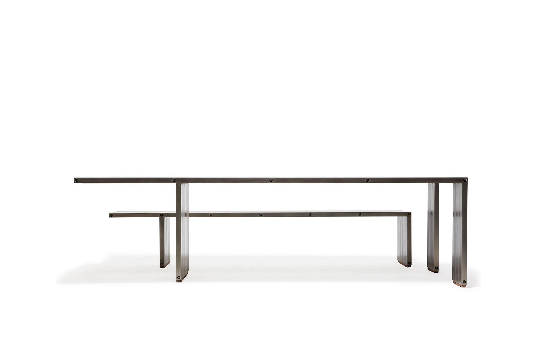 https://a.1stdibscdn.com/aluminum-compression-table-in-antique-nickel-for-sale-picture-2/f_24923/f_309951121666643858646/StephenKenn_AntiqueNickel_CompressionDiningSet_2019_01_web_master.jpg