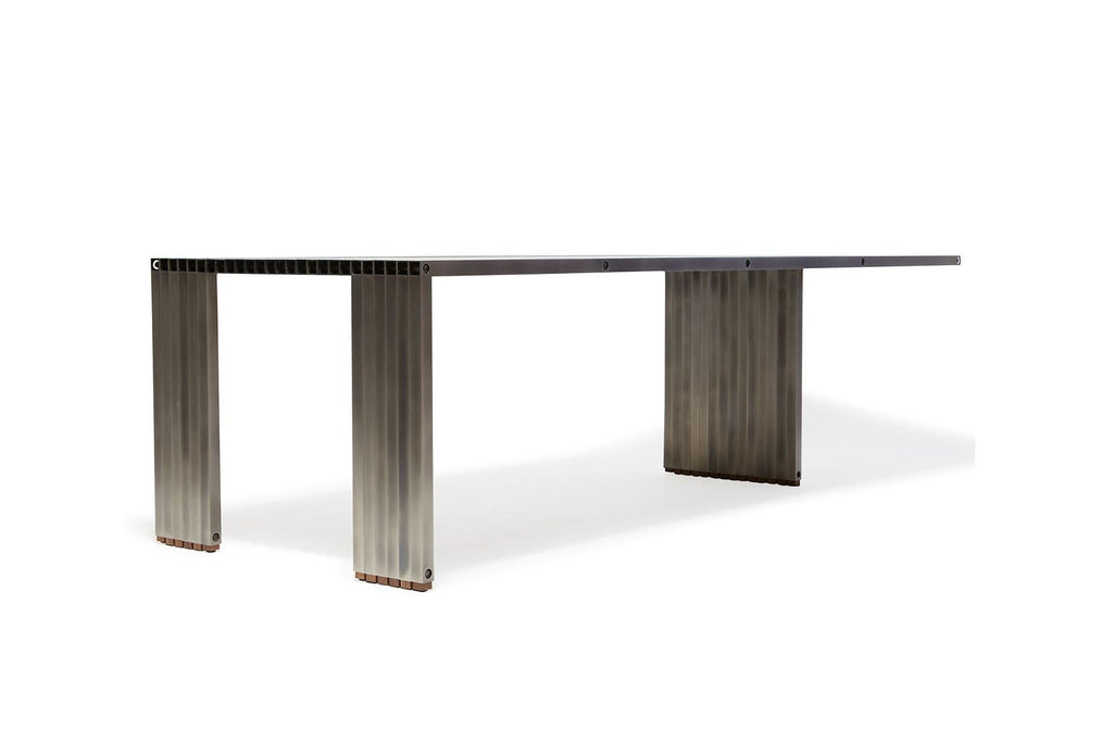 https://a.1stdibscdn.com/aluminum-compression-table-in-antique-nickel-for-sale-picture-8/f_24923/f_309951121666643867674/StephenKenn_AntiqueNickel_CompressionDiningTable_2019_06_web_master.jpg