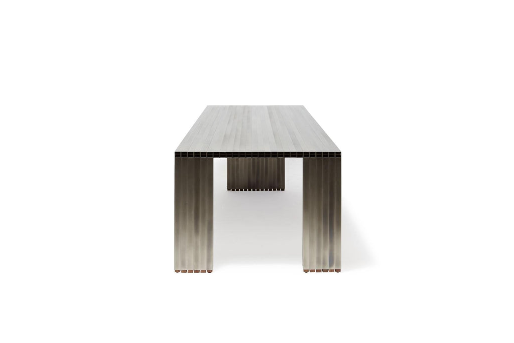 https://a.1stdibscdn.com/aluminum-compression-table-in-antique-nickel-for-sale-picture-10/f_24923/f_309951121666643867695/StephenKenn_AntiqueNickel_CompressionDiningTable_2019_08_web_master.jpg
