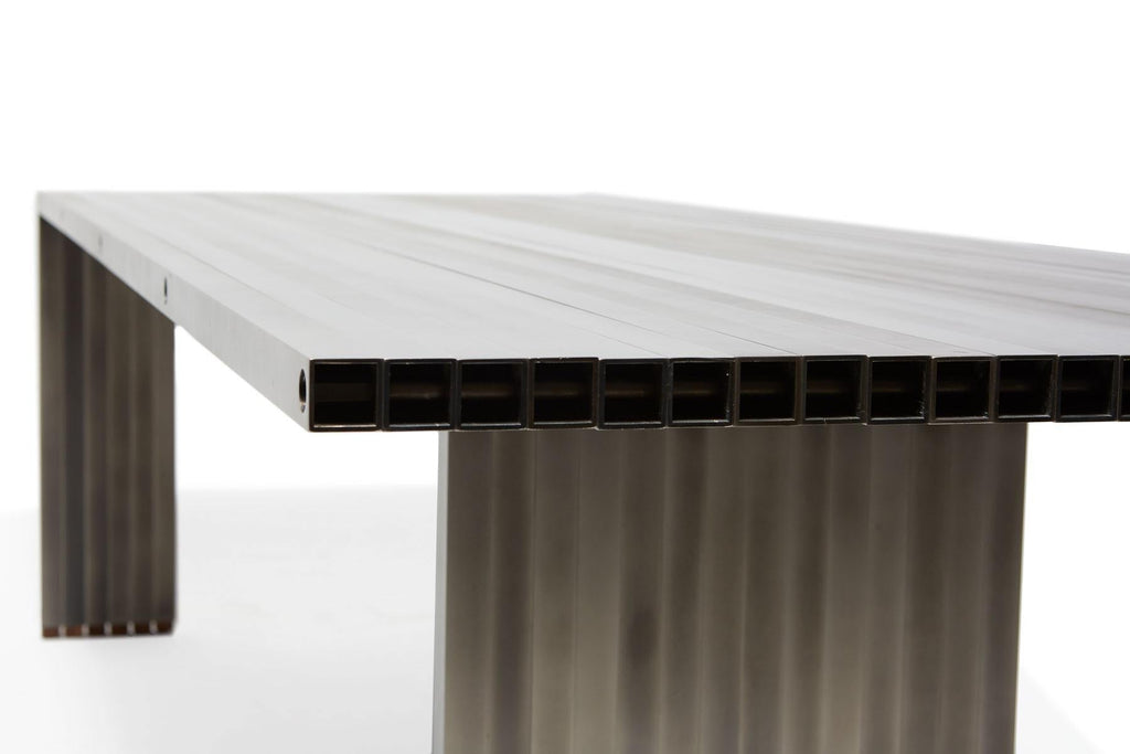 https://a.1stdibscdn.com/aluminum-compression-table-in-antique-nickel-for-sale-picture-13/f_24923/f_309951121666643867853/StephenKenn_AntiqueNickel_CompressionDiningTable_2019_11_web_master.jpg