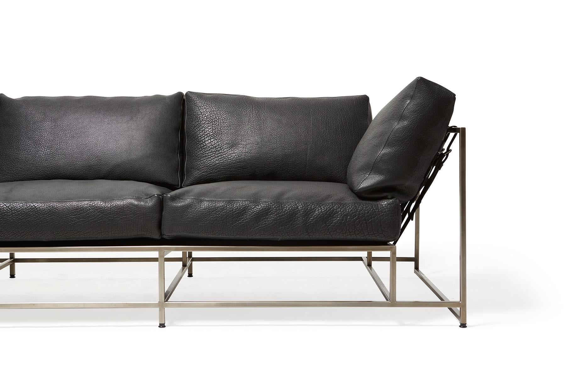 https://a.1stdibscdn.com/black-bison-leather-antique-nickel-sofa-for-sale-picture-4/f_24923/f_176673821579711849122/StephenKenn_BlackBisonLeather_AntNickel_Sofa_2019_04_web_master.jpg
