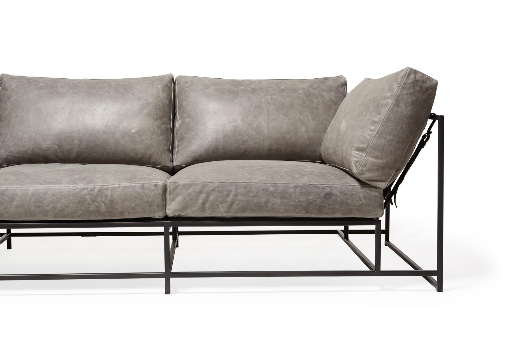 https://a.1stdibscdn.com/grey-waxed-leather-sofa-with-charcoal-powdercoat-for-sale-picture-6/f_24923/f_220112721609873603511/StephenKenn_BurnhamSeaSalt_CharcoalPowdercoat_Sofa_2020_02_web_master.jpg