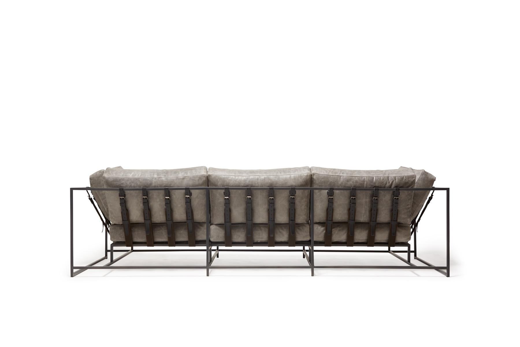 https://a.1stdibscdn.com/grey-waxed-leather-sofa-with-charcoal-powdercoat-for-sale-picture-3/f_24923/f_220112721609873604969/StephenKenn_BurnhamSeaSalt_CharcoalPowdercoat_Sofa_2020_04_web_master.jpg