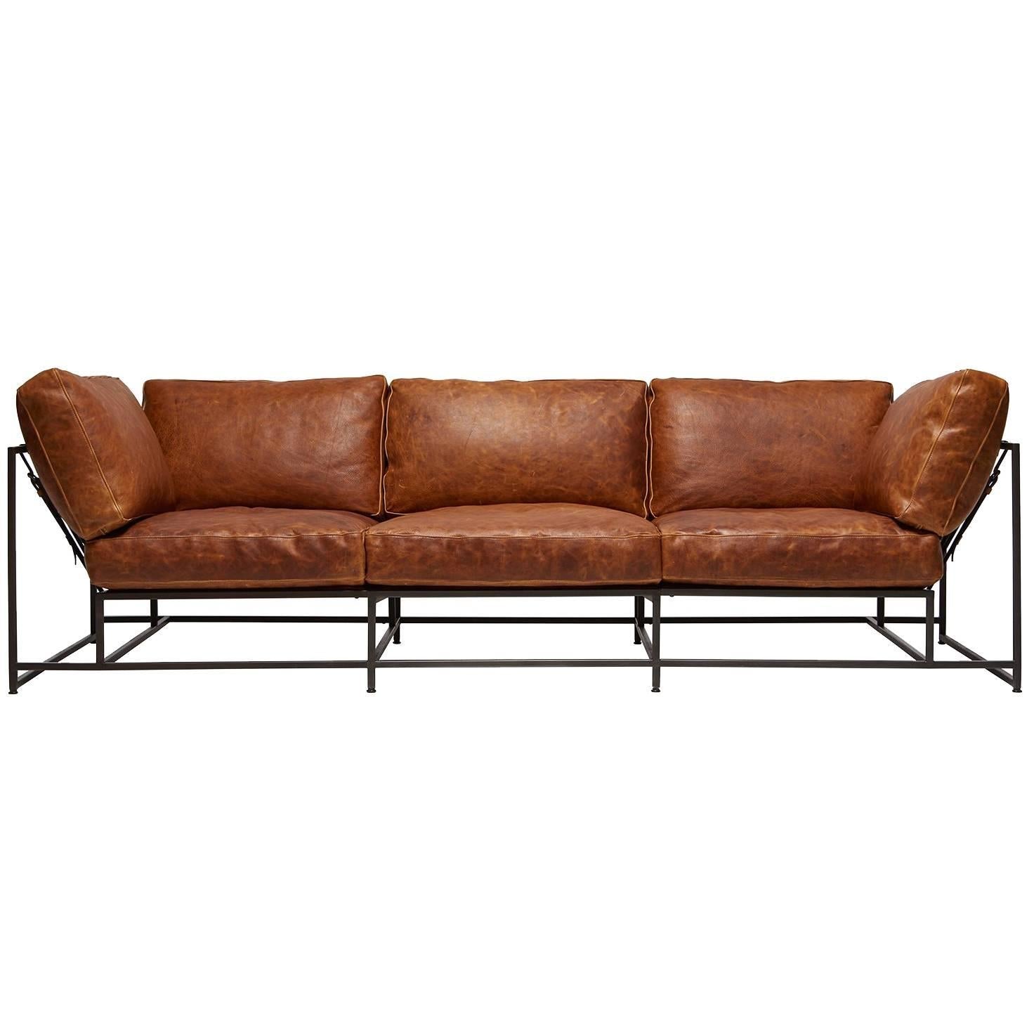 https://a.1stdibscdn.com/archivesE/upload/3663232/f_65351231486406915954/StephenKenn_CognacLeather_CustomSofa_2_web_org_master.jpg