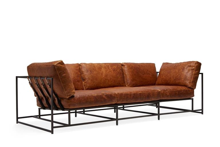 https://a.1stdibscdn.com/archivesE/upload/f_24923/f_65351231485908344502/StephenKenn_CognacLeather_CustomSofa_3_web_l.jpg
