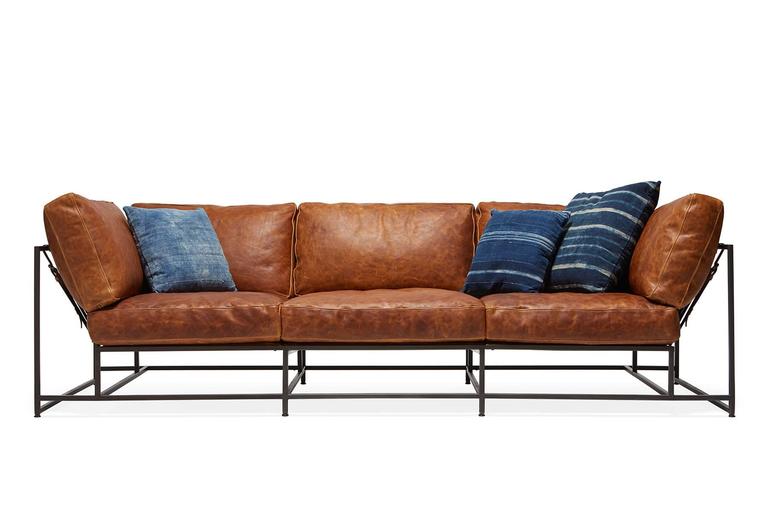 https://a.1stdibscdn.com/archivesE/upload/f_24923/f_65351231485908347357/StephenKenn_CognacLeather_CustomSofa_9_web_l.jpg
