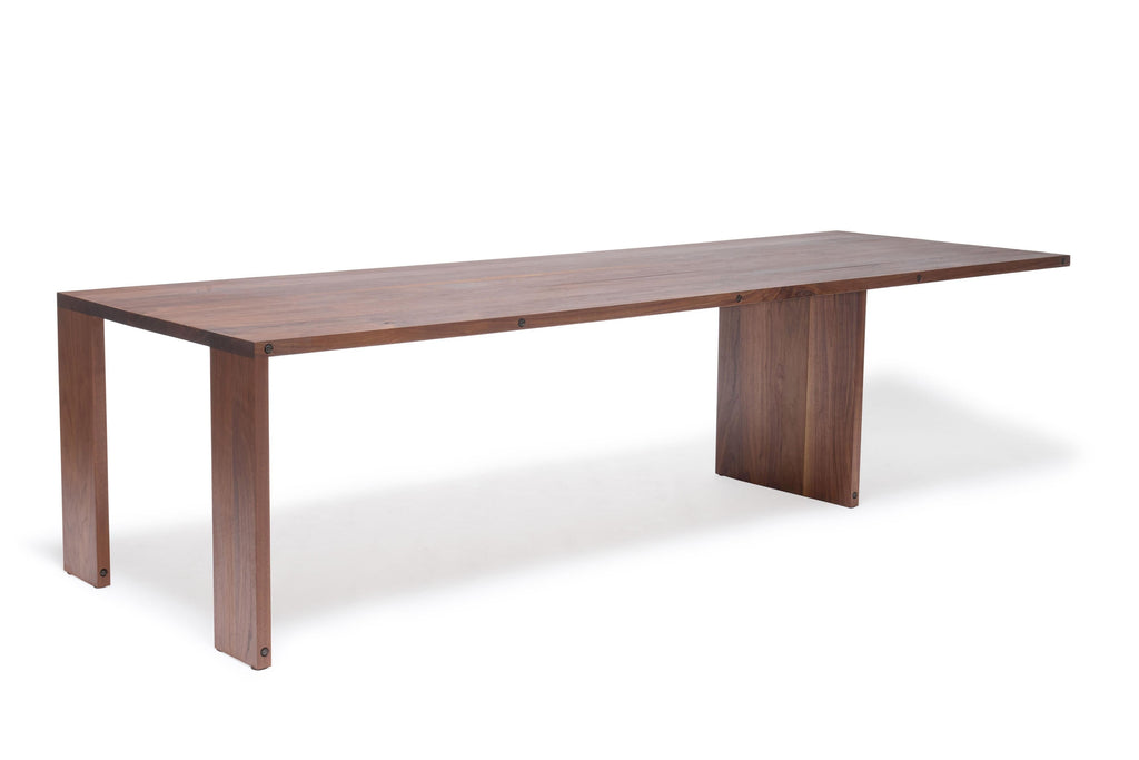 https://a.1stdibscdn.com/compression-dining-table-in-walnut-wood-for-sale-picture-2/f_24923/f_309954621666646943165/StephenKenn_CompressionTable_Walnut_02_web_master.jpg