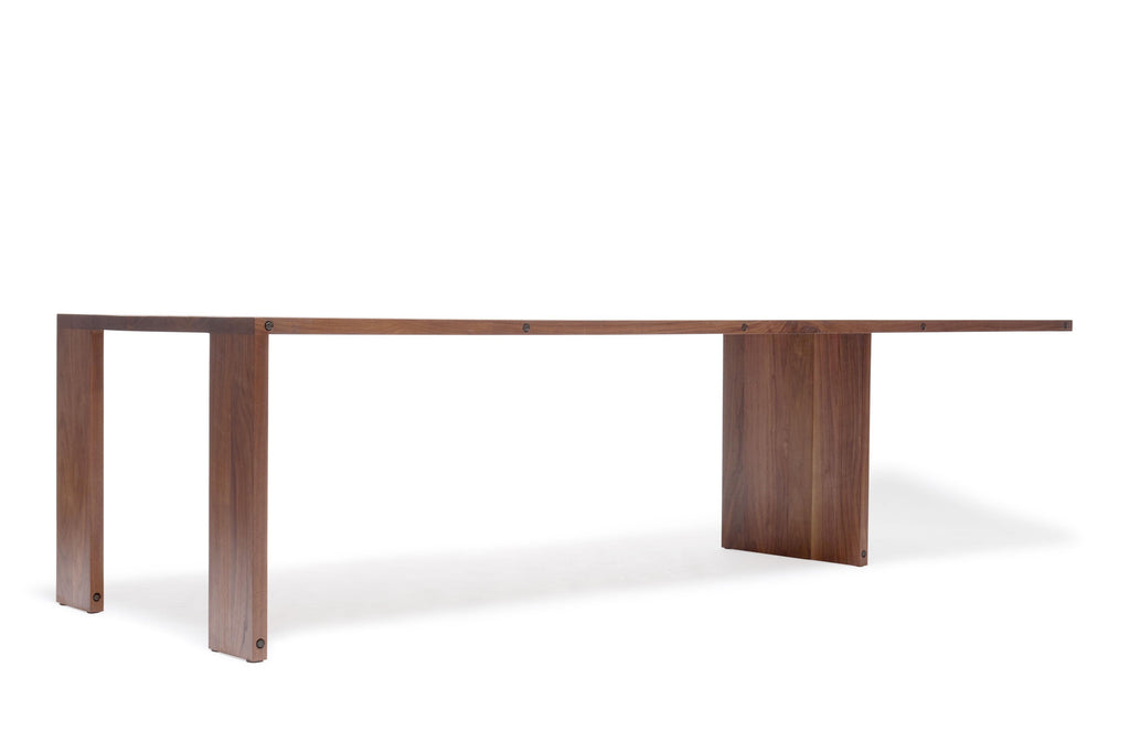 https://a.1stdibscdn.com/compression-dining-table-in-walnut-wood-for-sale-picture-5/f_24923/f_309954621666646937349/StephenKenn_CompressionTable_Walnut_05_web_master.jpg
