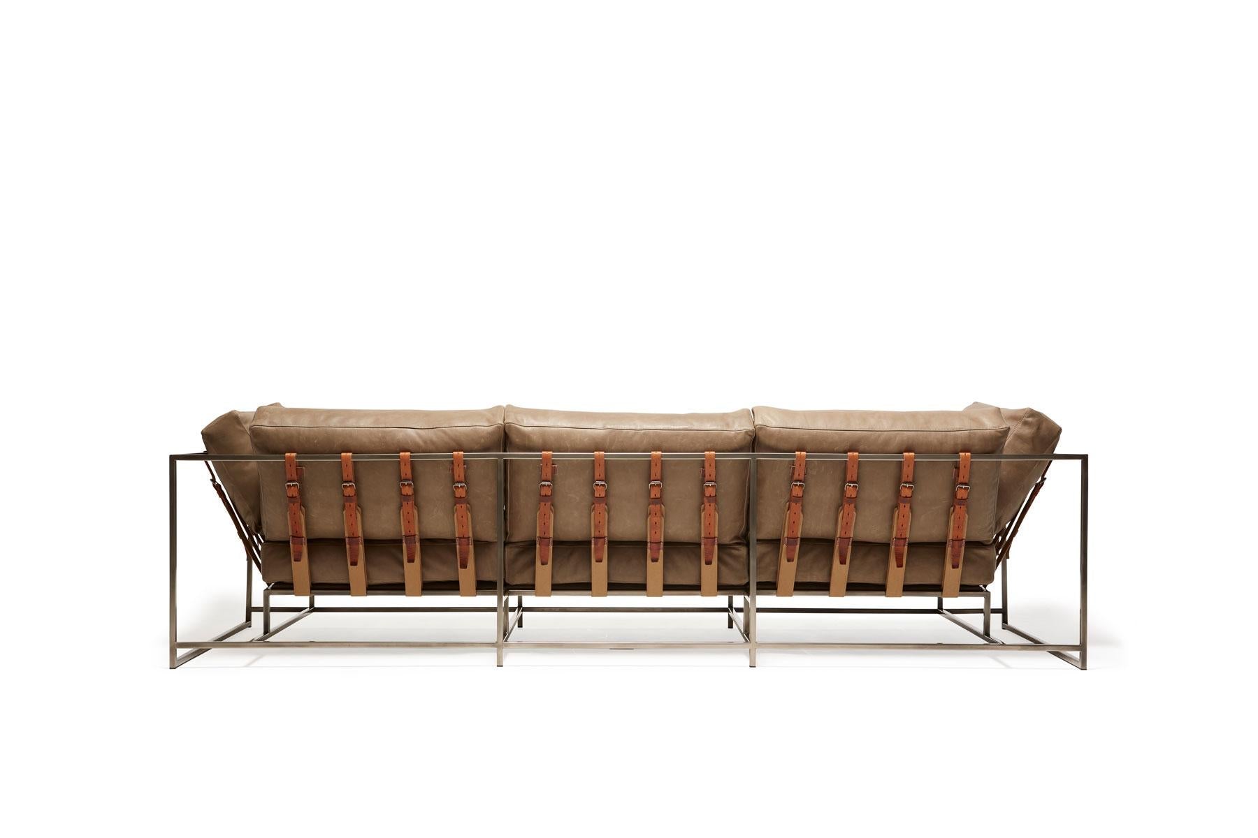 https://a.1stdibscdn.com/pebbled-taupe-leather-antique-nickel-sofa-for-sale-picture-3/f_24923/f_276916321646766545411/StephenKenn_HarnessPutty_AntiqueNickel_Sofa_2021_03_web_master.jpg