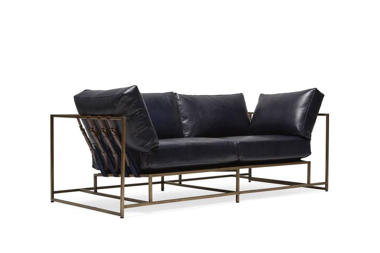 https://a.1stdibscdn.com/archivesE/upload/f_24923/1485892334642/StephenKenn_IndigoLeather_AntiqueBrass_TwoSeat_Sofa_2_web_l.jpg