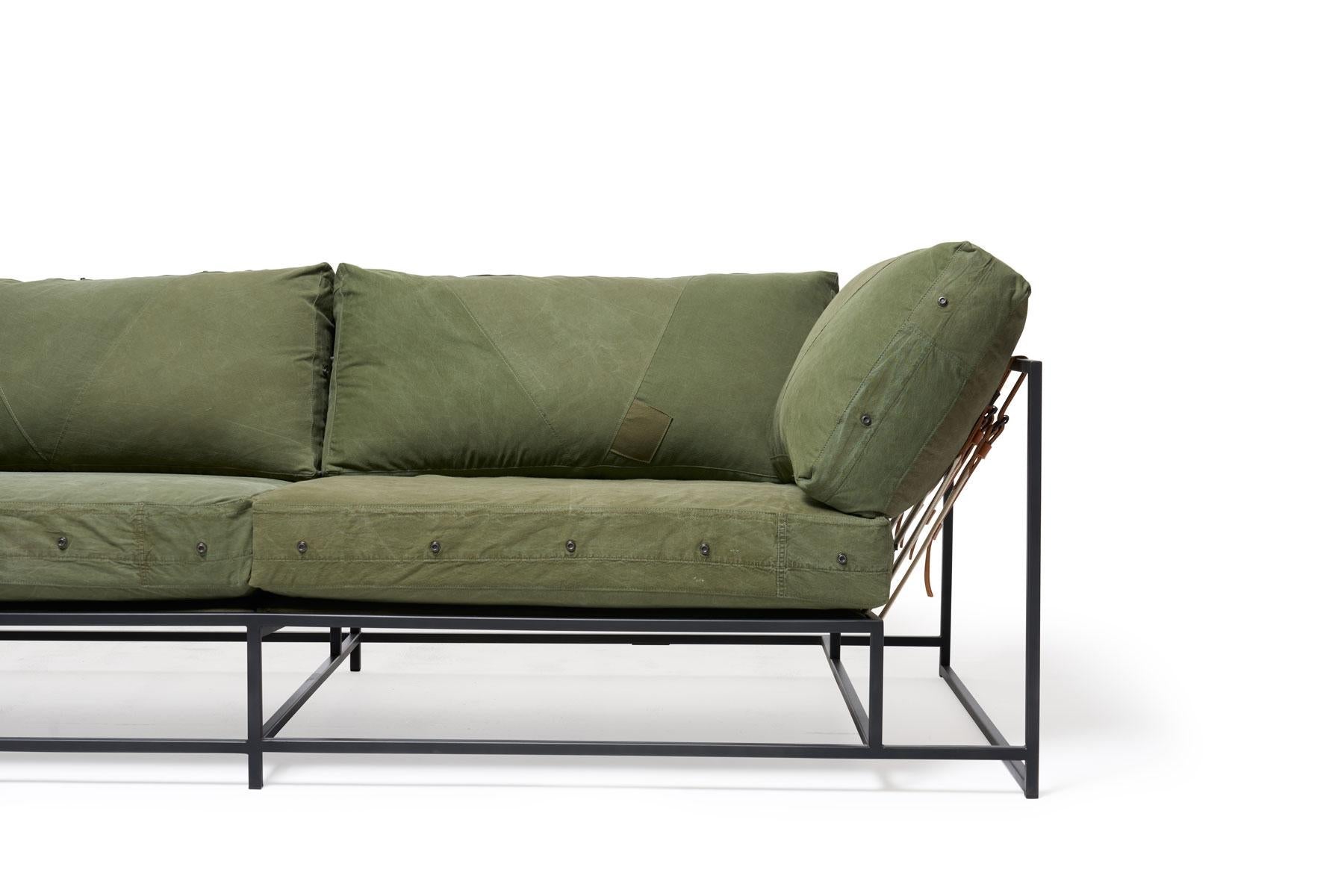 https://a.1stdibscdn.com/vintage-military-canvas-and-blackened-steel-two-seat-sofa-for-sale-picture-4/f_24923/f_276931621646771003625/StephenKenn_MilitaryCanvas_BlkSteel_TwoSeatSofa_2021_04_web_master.jpg