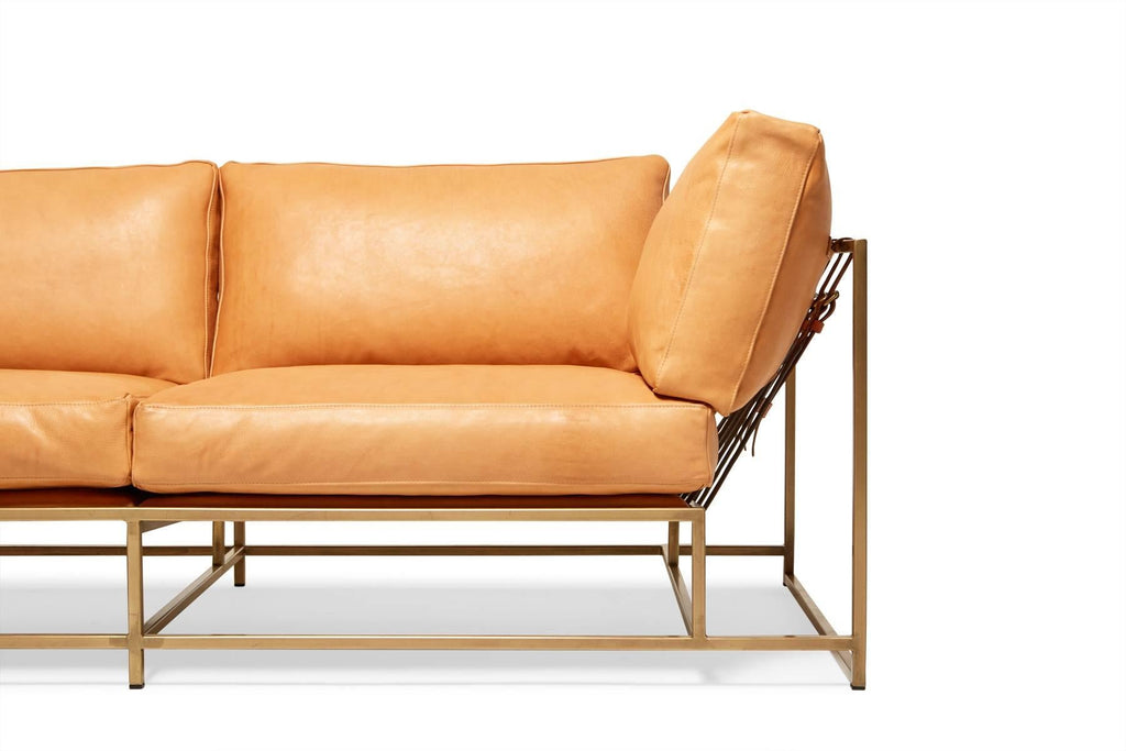 https://a.1stdibscdn.com/archivesE/upload/f_24923/1508435137996/StephenKenn_NaturalLeather_AntiqueBrass_TwoSeatSofa_4532_web_master.jpg