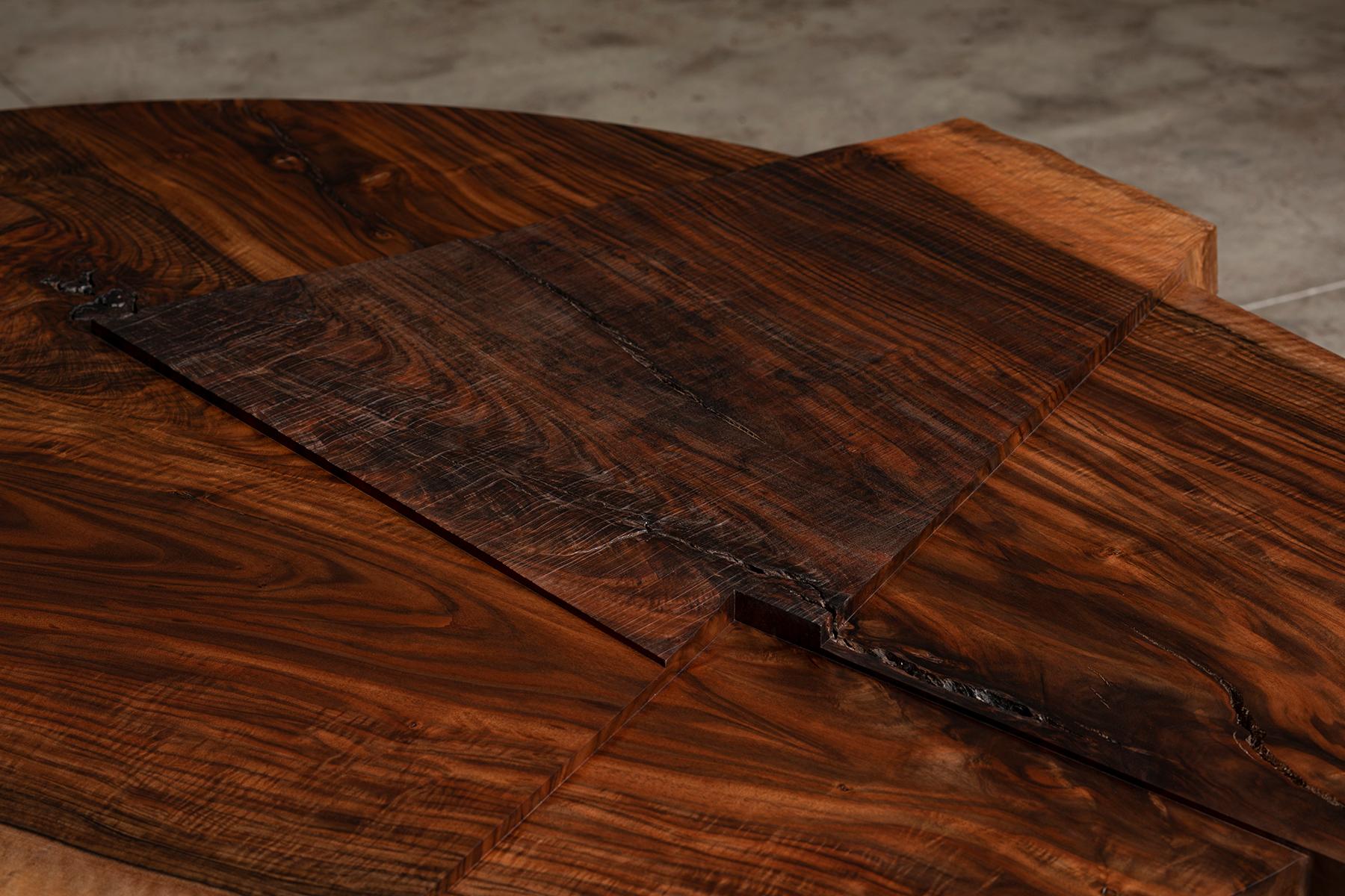 https://a.1stdibscdn.com/claro-walnut-single-slab-strike-slip-round-dining-table-for-sale-picture-4/f_23463/1613606005548/Strike_Slip_Round_VI_Top_Roughsawn_R_master.jpg