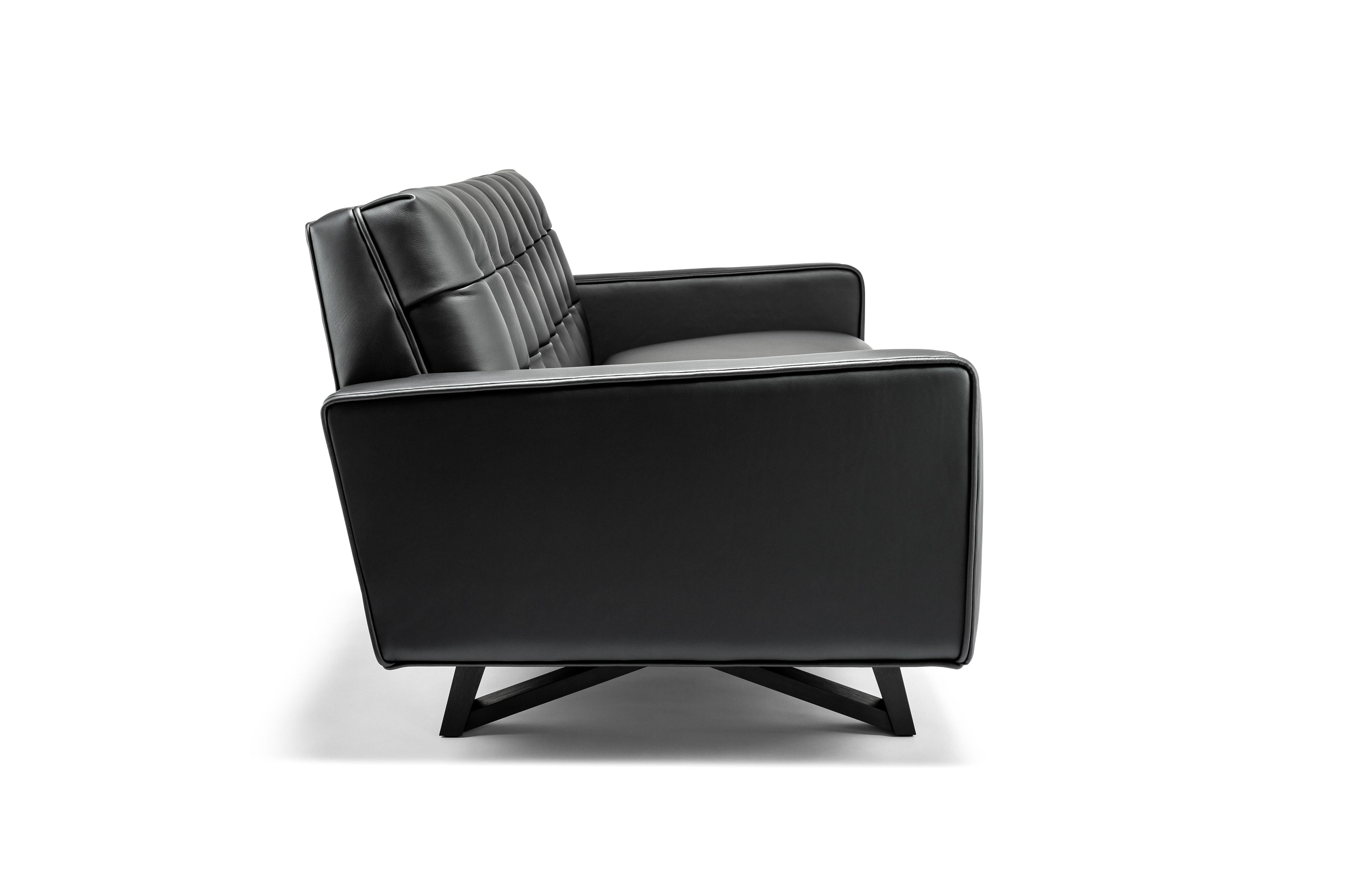 https://a.1stdibscdn.com/contemporary-adoni-obsidian-sofa-in-100-british-black-leather-and-natural-wax-for-sale-picture-3/f_27813/f_144947221556187980202/Stuart_Scott_Adoni_Obsidian_Sofa_master.jpg