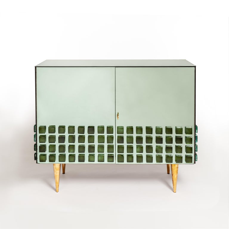 https://a.1stdibscdn.com/italian-studio-made-mirrored-emerald-green-cabinet-hand-cast-opal-glass-stones-for-sale-picture-2/f_24383/f_469677321759934288737/StudioNo5_1876_Bearbeitet_master.jpg?width=768