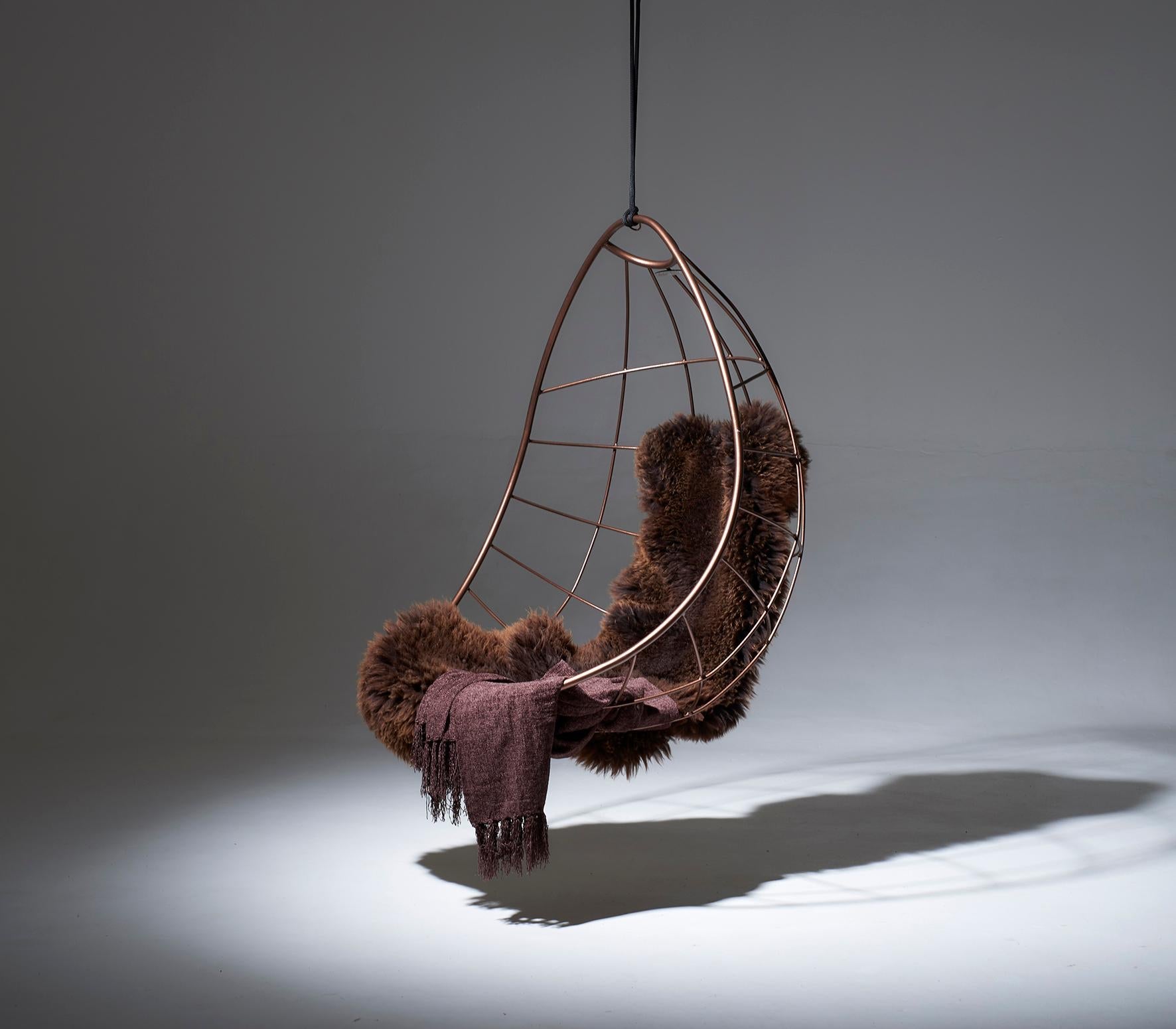 https://a.1stdibscdn.com/nest-egg-hanging-swing-chair-steel-modern-in-outdoor-21st-century-black-twig-for-sale-picture-12/f_32773/f_95535731610226447373/Studio_Stirling_Bronze_master.jpg