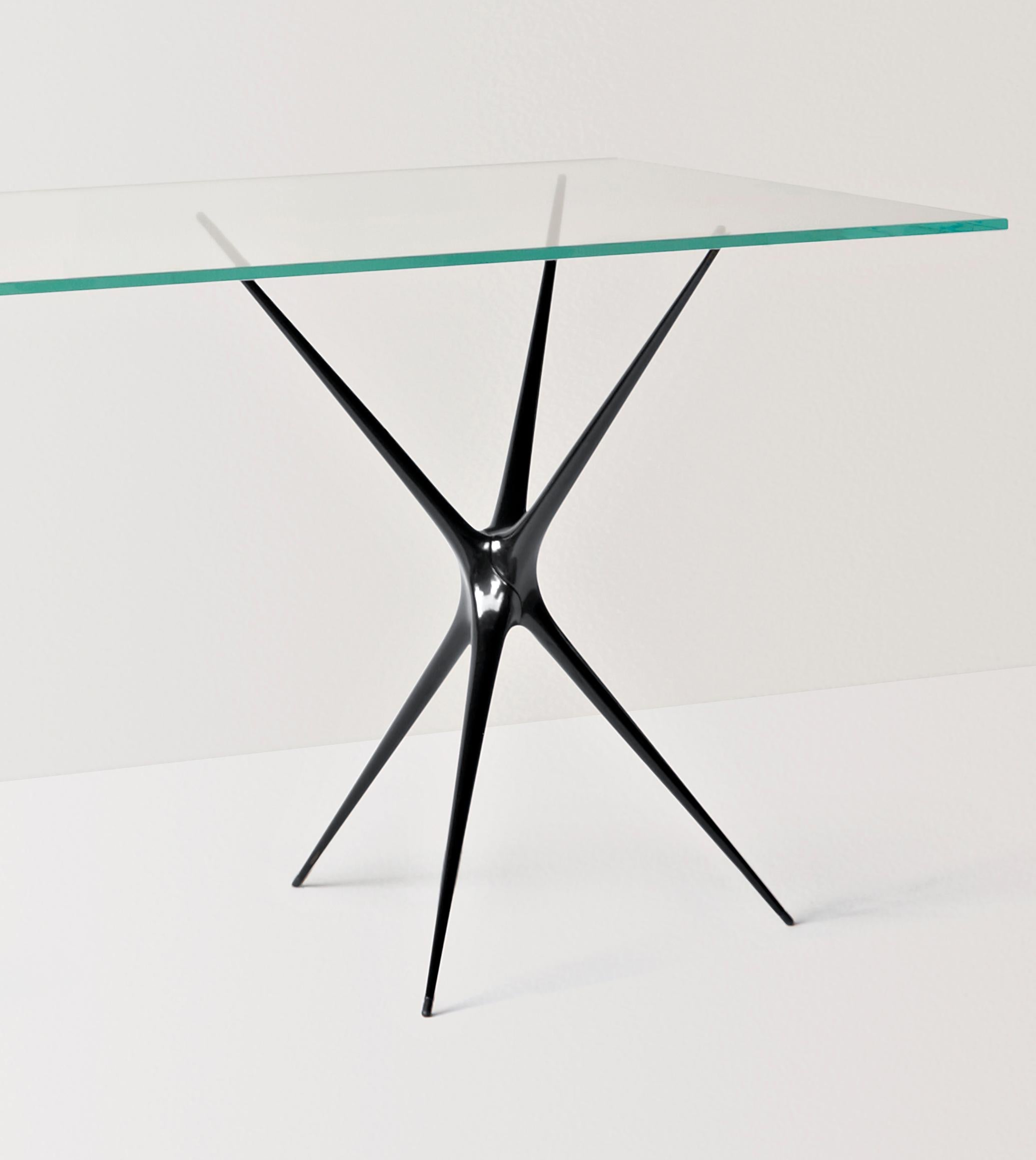 https://a.1stdibscdn.com/supernova-recycled-cast-aluminum-black-trestles-glass-desk-by-made-in-ratio-for-sale-picture-3/f_36441/f_120359631597921025050/Supernvoa_black_cutout_master.jpg