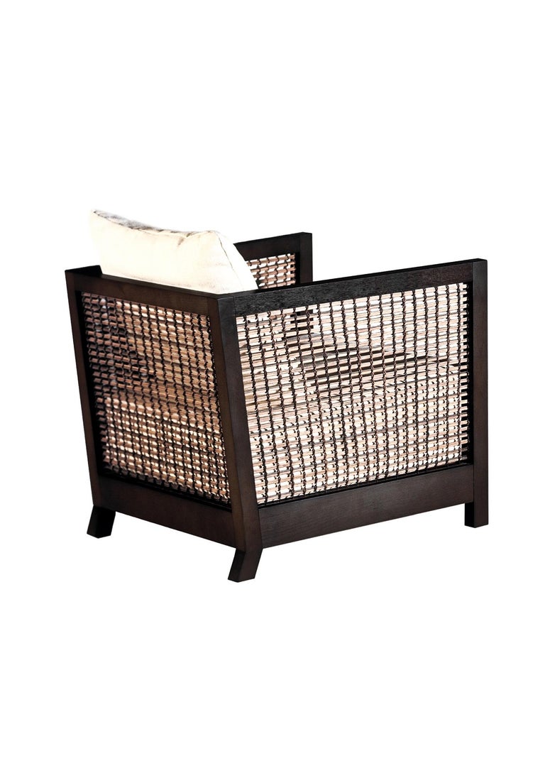 https://a.1stdibscdn.com/maple-lowback-suzy-wong-easy-armchair-by-kenneth-cobonpue-for-sale-picture-3/f_12192/f_327872521676480496789/Suzy_Wong_Easy_Armchair_lowback_01_master.jpg?width=768