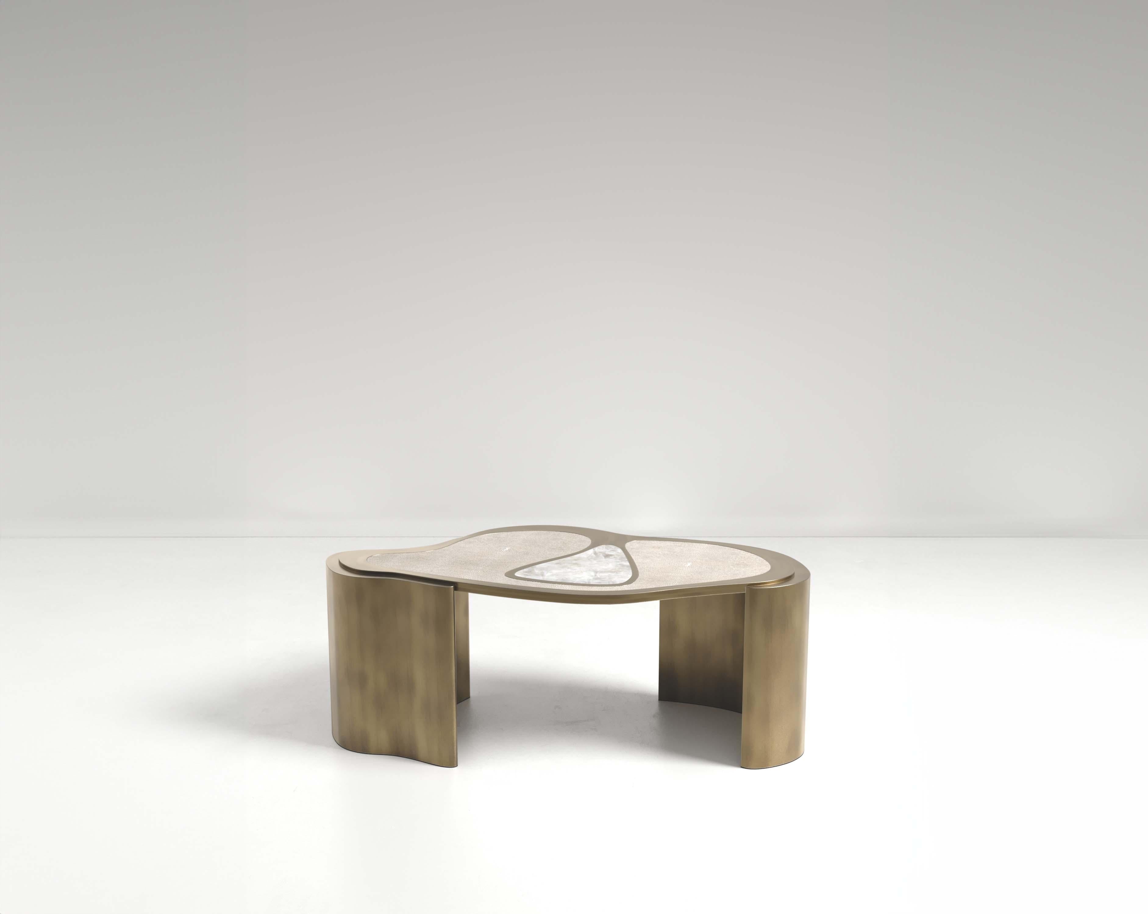 https://a.1stdibscdn.com/shagreen-coffee-table-with-bronze-patina-brass-details-by-kifu-paris-for-sale-picture-7/f_45491/f_378529821704762180301/TABLE0000_copie_1_master.jpg