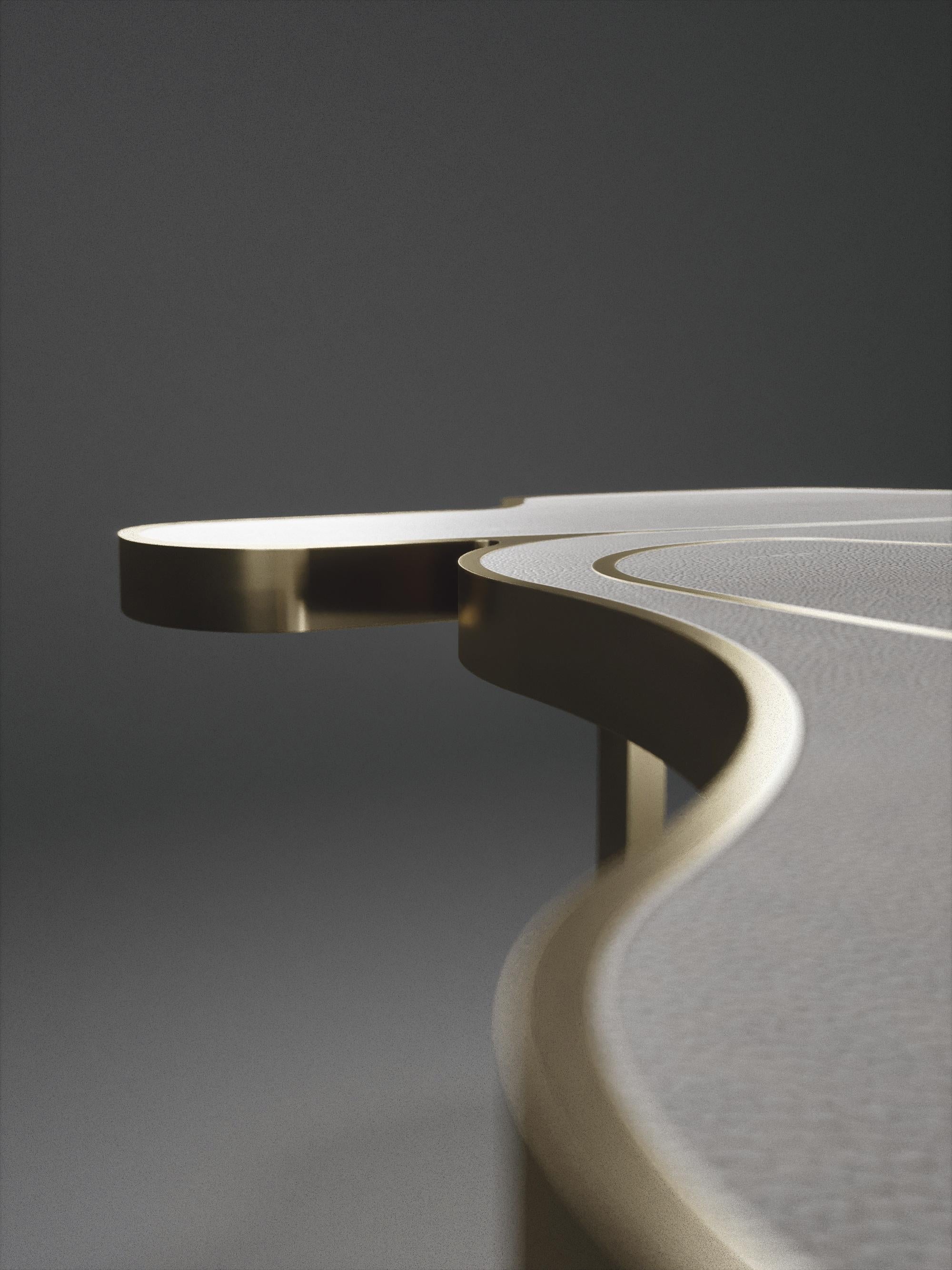 https://a.1stdibscdn.com/shagreen-cocteau-coffee-table-with-bronze-patina-brass-accents-by-r-y-augousti-for-sale-picture-5/f_45491/f_235319921619447091544/TABLE_Cocteau_V1_OPT10000_master.jpg