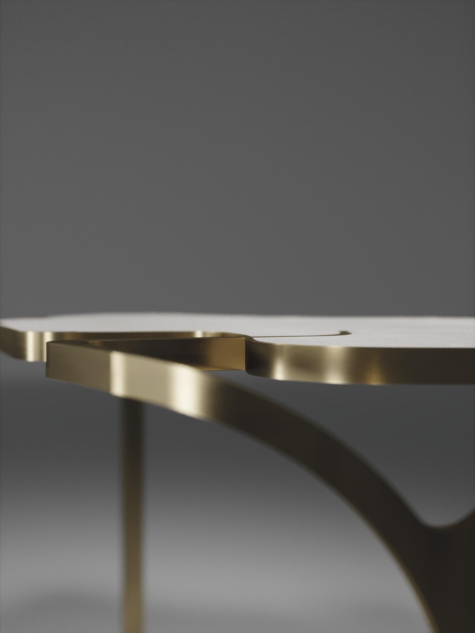 https://a.1stdibscdn.com/shagreen-cocteau-coffee-table-with-bronze-patina-brass-accents-by-r-y-augousti-for-sale-picture-7/f_45491/f_233630121618326176063/TABLE_Cocteau_V1_OPT10011_master.jpg