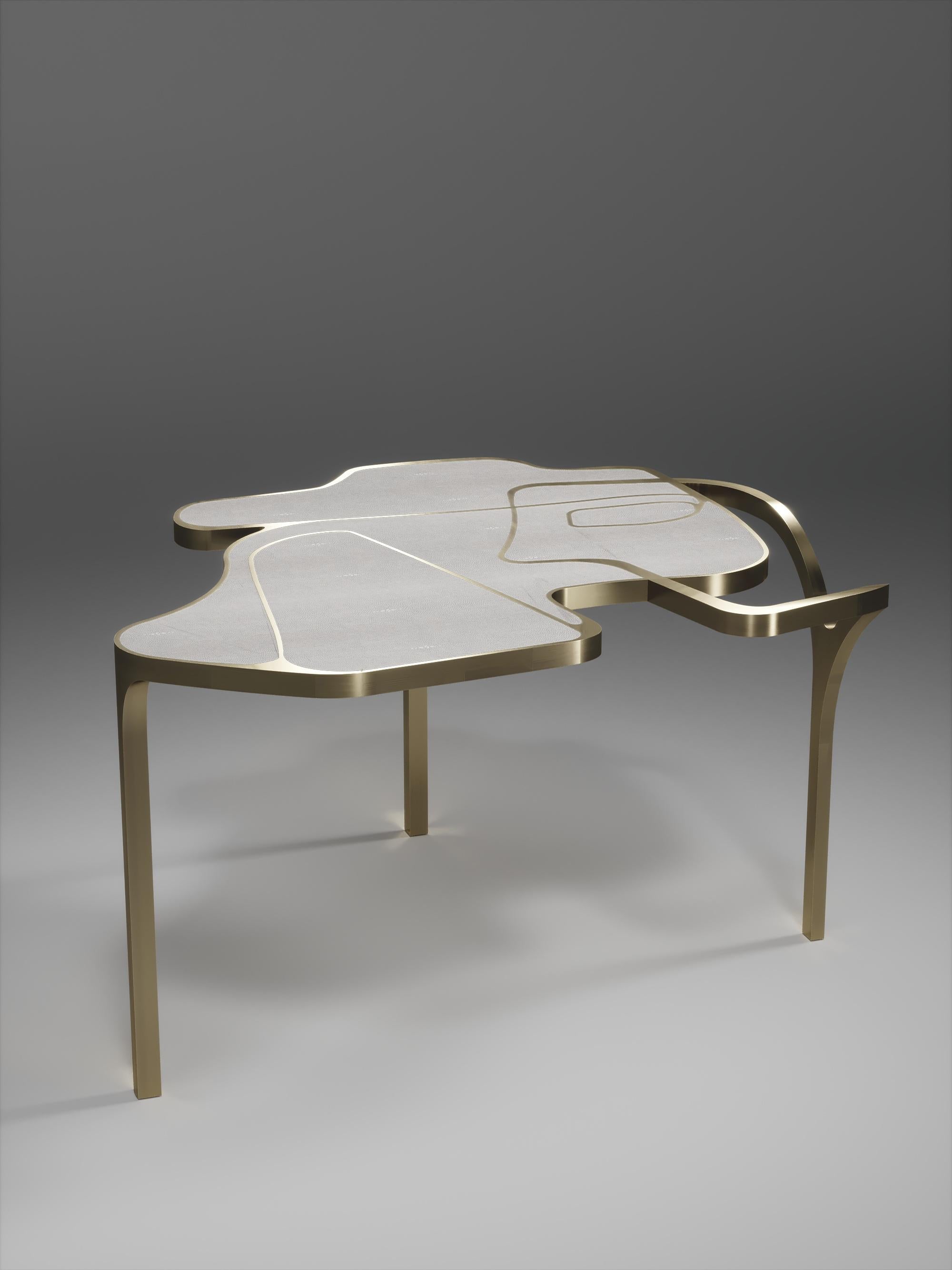 https://a.1stdibscdn.com/shagreen-cocteau-coffee-table-with-bronze-patina-brass-accents-by-r-y-augousti-for-sale-picture-3/f_45491/f_235319921619447095255/TABLE_Cocteau_V1_OPT10014_master.jpg