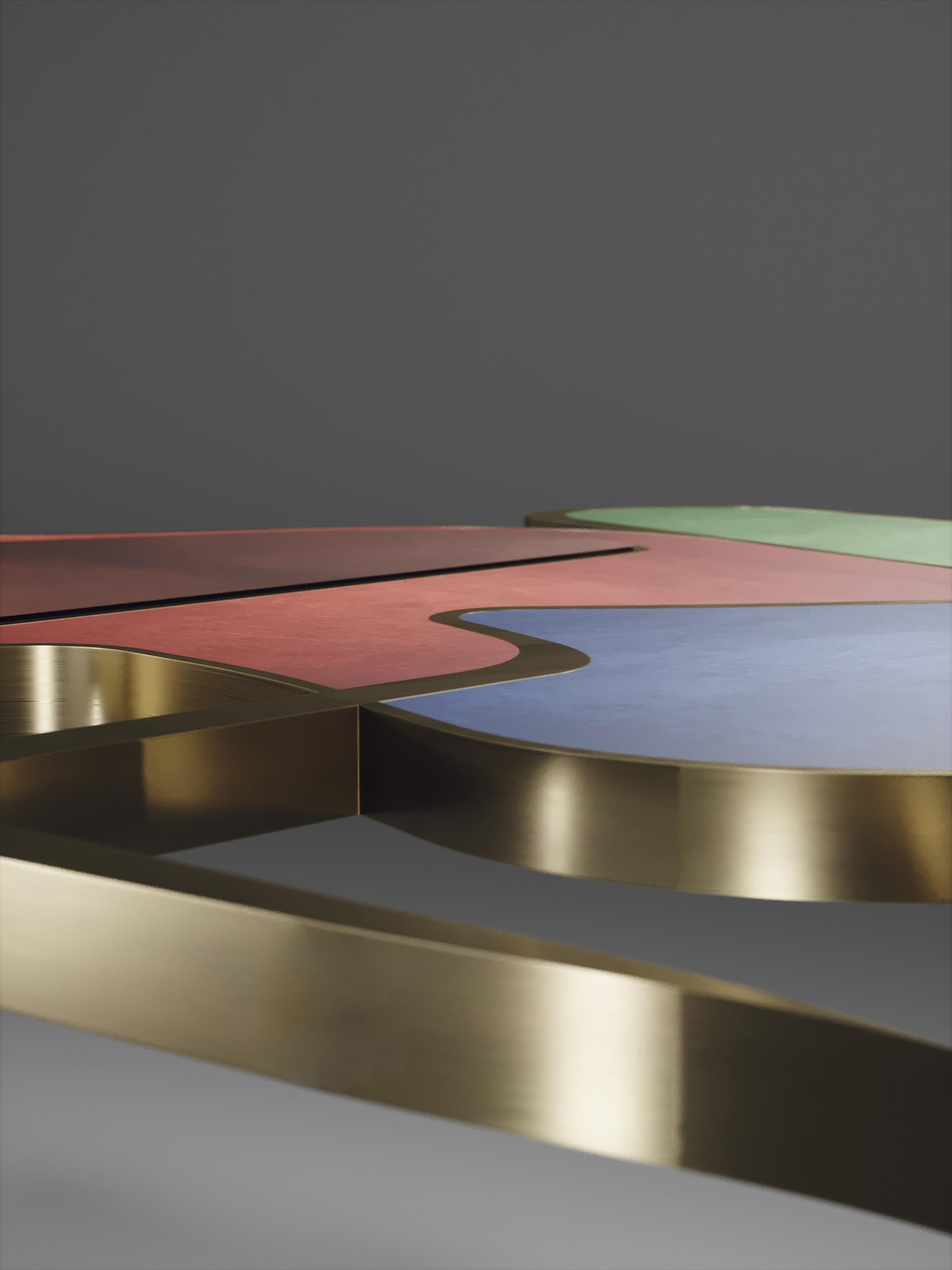 https://a.1stdibscdn.com/parchment-cocteau-coffee-table-with-brass-accents-by-r-y-augousti-for-sale-picture-4/f_45491/f_227975621614932543076/TABLE_Cocteau_V1_OPT30009_master.jpg