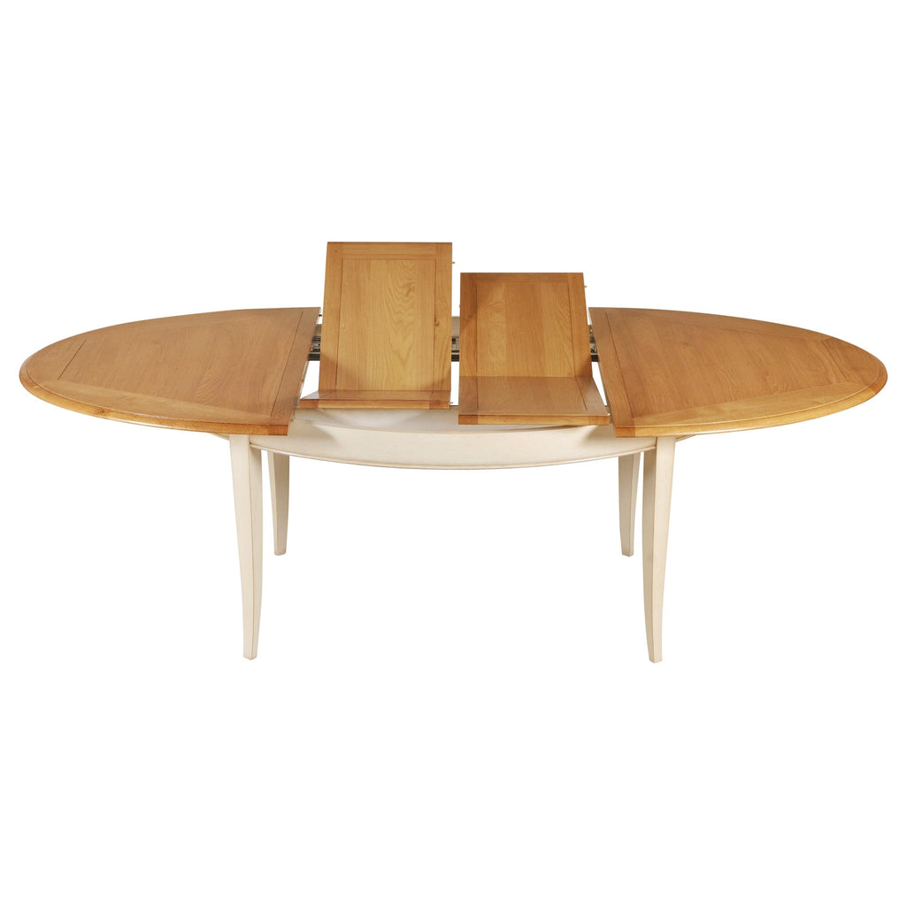 https://a.1stdibscdn.com/oval-extensible-dining-table-in-solid-oak-in-a-french-countryside-style-for-sale-picture-3/f_57342/f_256699021633960807688/TRA_5703CCBC_Table_ovale_2_allonges_ch_ne_cannelle_et_blanc_cr_me_profil_2_allonges_ouvertes_3000x3000_master.jpg