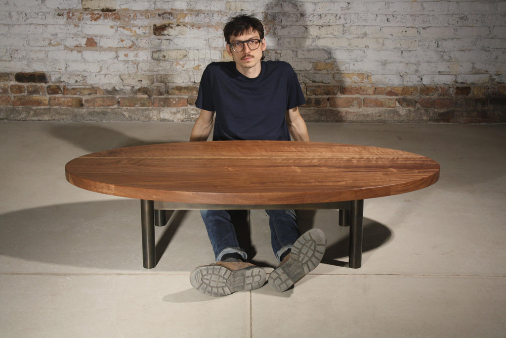 https://a.1stdibscdn.com/humboldt-low-table-or-coffee-table-by-laylo-studio-in-walnut-and-blackened-steel-for-sale-picture-5/f_53231/f_309880721666618723099/TRUE_table_Sam_master.JPG