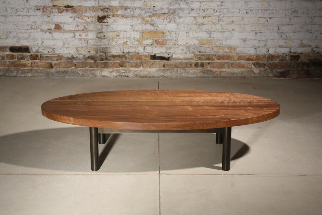 https://a.1stdibscdn.com/humboldt-low-table-or-coffee-table-by-laylo-studio-in-walnut-and-blackened-steel-for-sale-picture-2/f_53231/f_309880721666618724900/TRUE_table_deadon_master.JPG