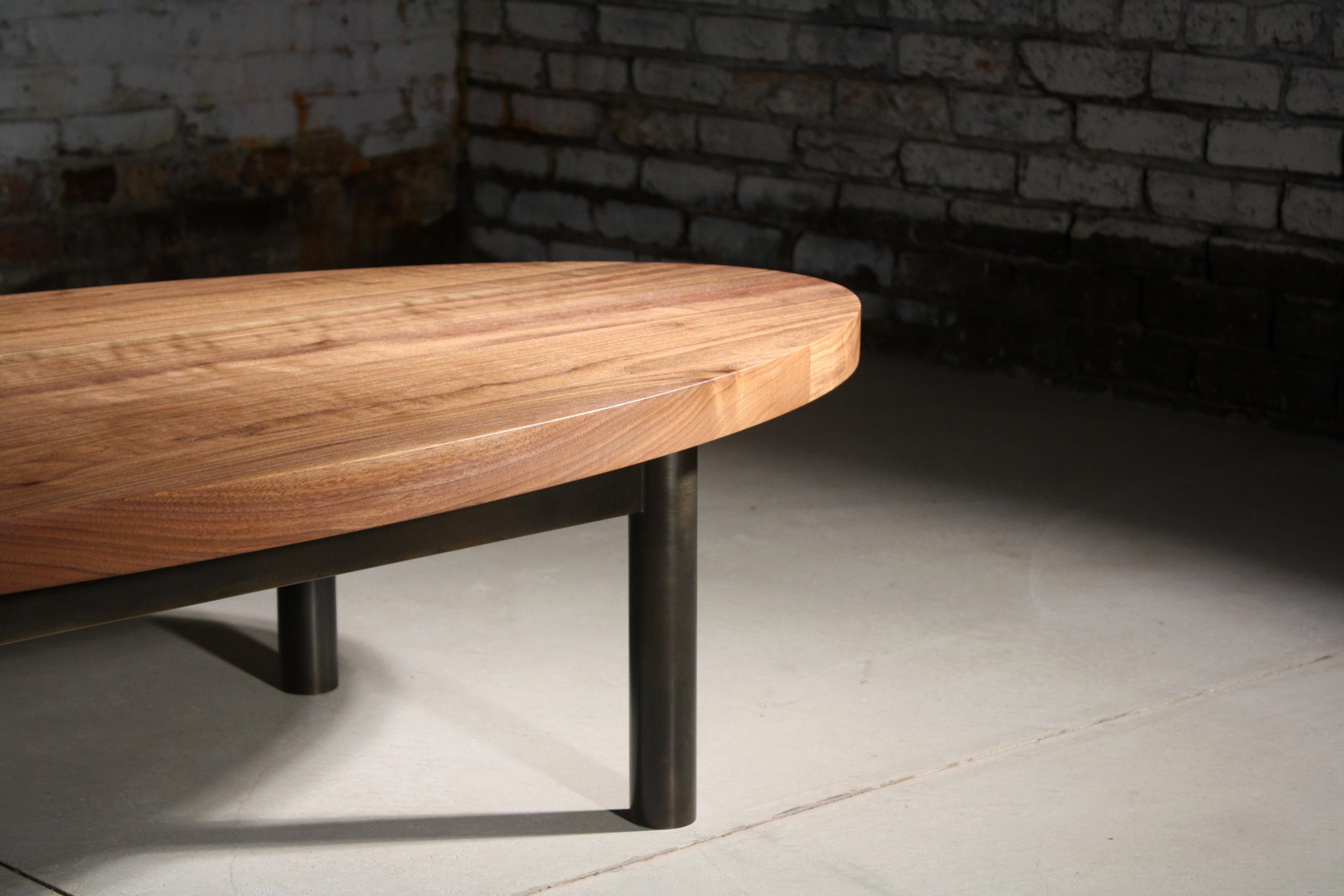 https://a.1stdibscdn.com/humboldt-low-table-or-coffee-table-by-laylo-studio-in-walnut-and-blackened-steel-for-sale-picture-3/f_53231/f_309880721666618724667/TRUE_table_legdetail_master.JPG