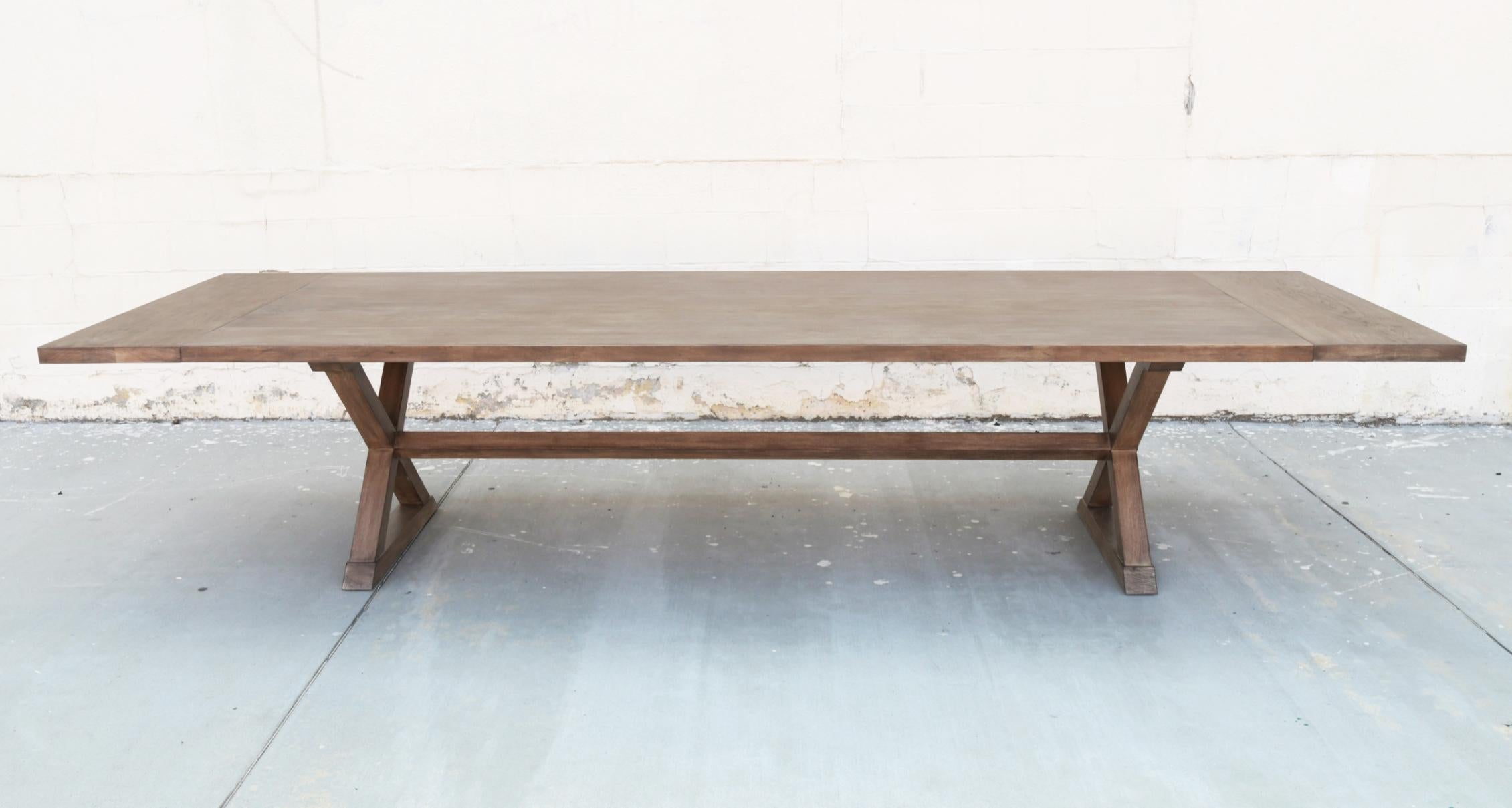https://a.1stdibscdn.com/expandable-minimalist-x-trestle-table-in-walnut-for-sale-picture-8/f_8065/1589291502658/TT10_1_master.jpg