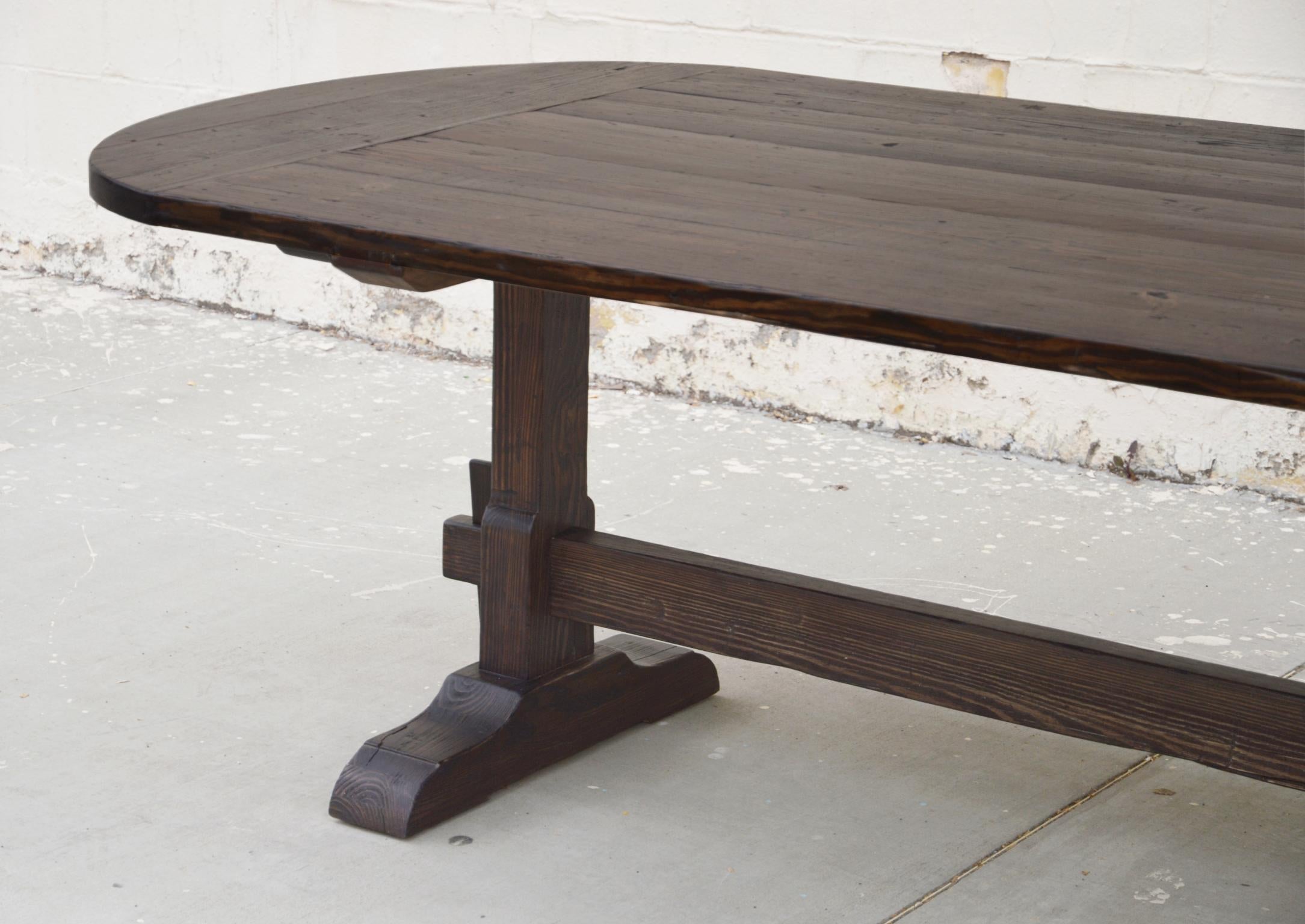 https://a.1stdibscdn.com/racetrack-trestle-table-made-from-reclaimed-pine-for-sale-picture-4/f_8065/f_156713011564595545966/TT2RT_7_master.jpg