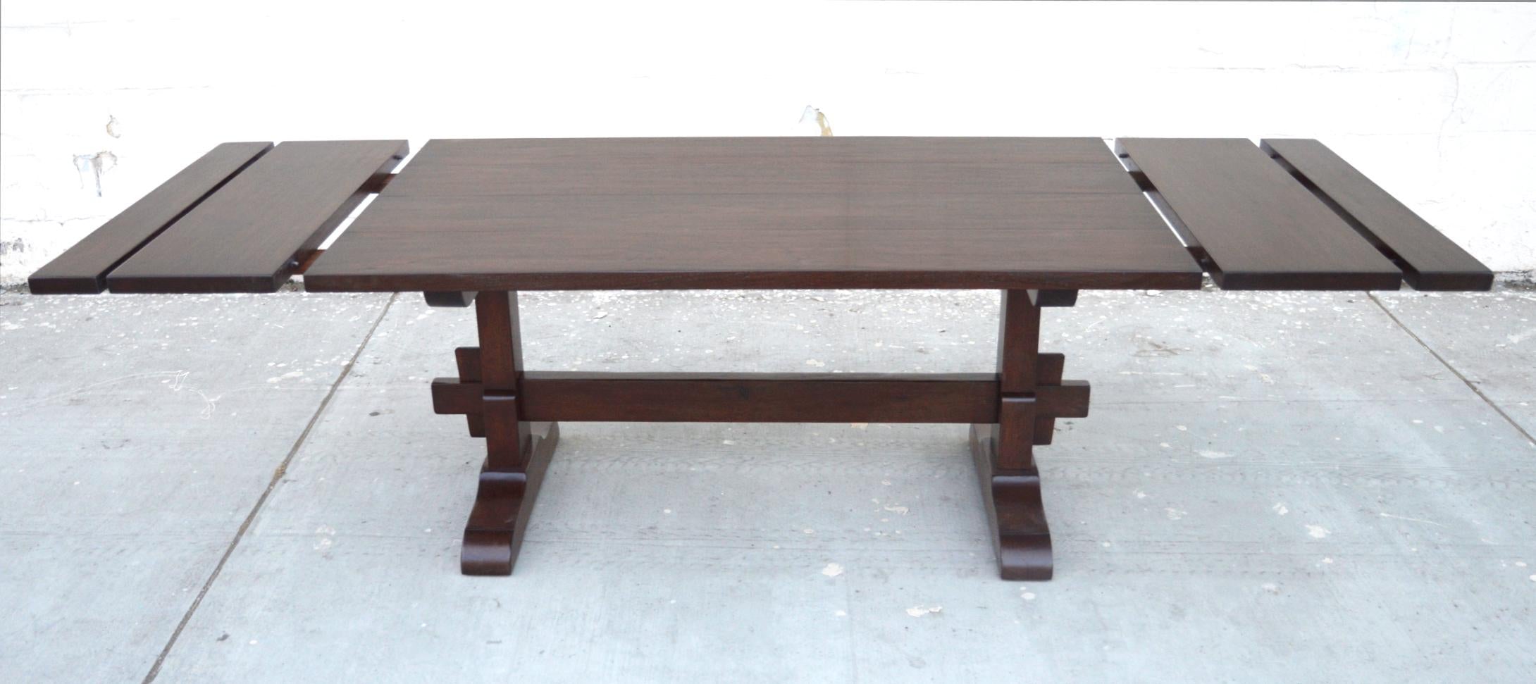 https://a.1stdibscdn.com/expandable-trestle-table-made-from-walnut-for-sale-picture-4/f_8065/1585226828387/TT2_2_master.jpg