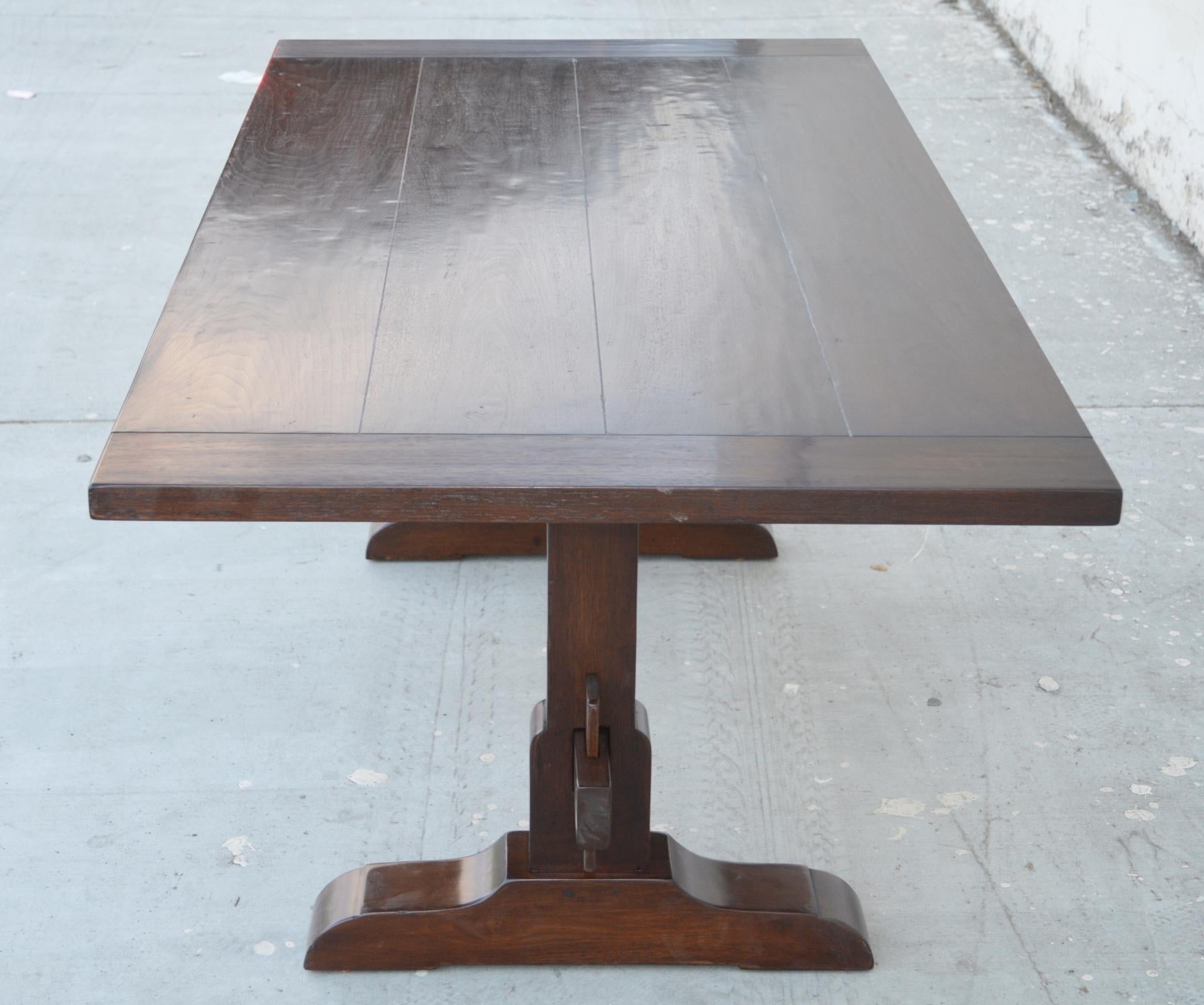 https://a.1stdibscdn.com/expandable-trestle-table-made-from-walnut-for-sale-picture-3/f_8065/1585226836288/TT2_5_master.jpg
