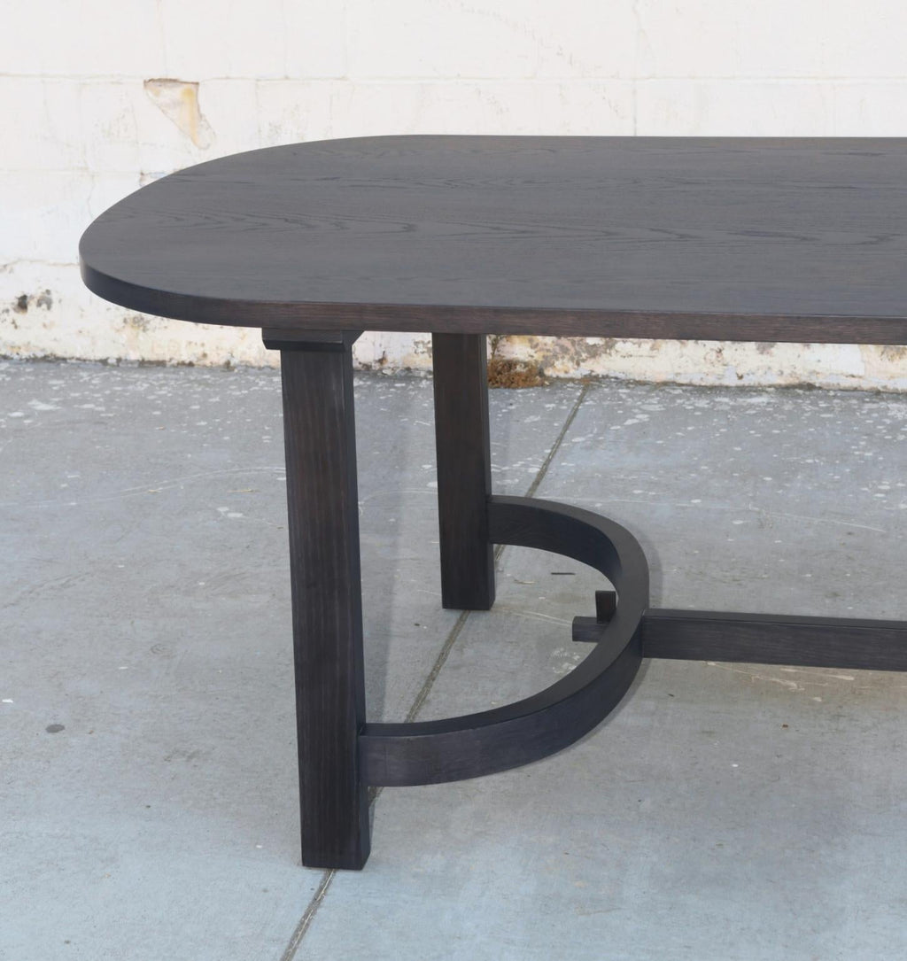 https://a.1stdibscdn.com/oak-racetrack-table-with-curved-stretcher-for-sale-picture-6/f_8065/1575554270471/TTR1_2_master.jpg