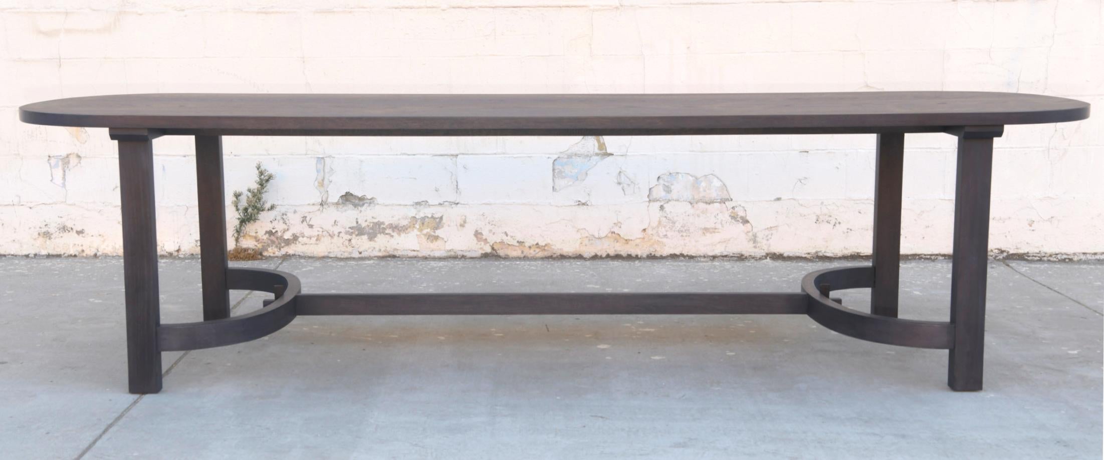 https://a.1stdibscdn.com/oak-racetrack-table-with-curved-stretcher-for-sale-picture-3/f_8065/1575554272144/TTR1_3_master.jpg