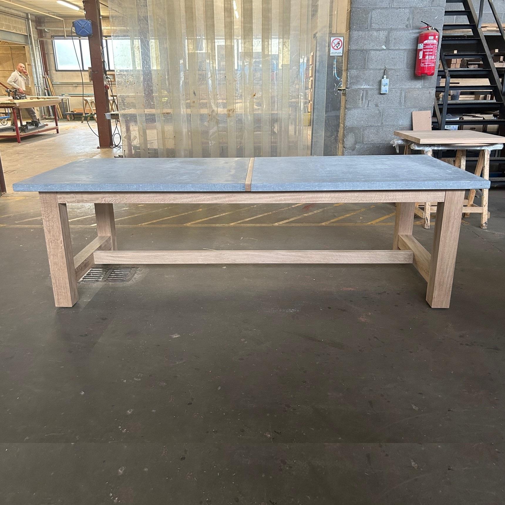 https://a.1stdibscdn.com/8-10-brutalist-style-outdoor-table-bluestone-solid-oak-for-sale-picture-3/f_27693/f_485272021769501434542/TT_2_master.jpg