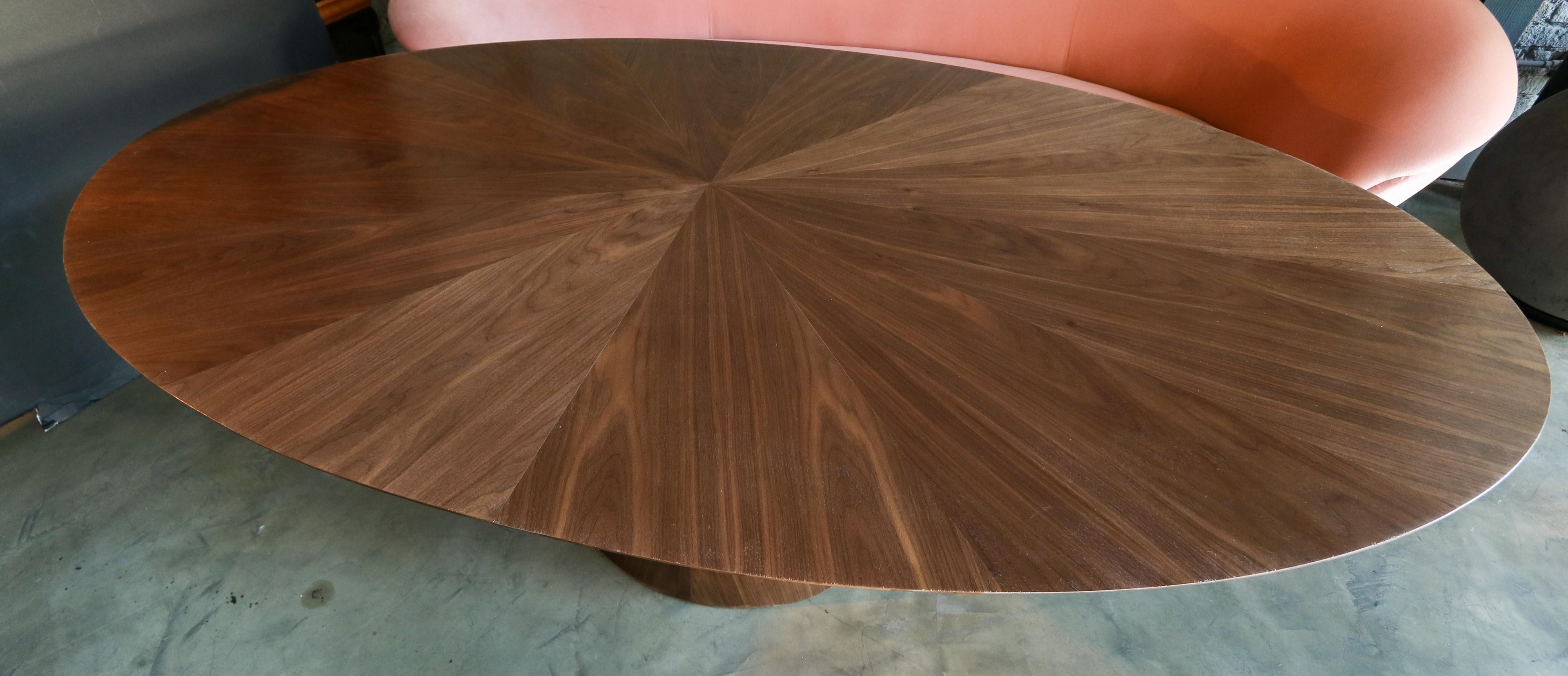 https://a.1stdibscdn.com/custom-mid-century-style-walnut-oval-dining-table-with-pedestal-base-for-sale-picture-5/f_8175/f_268673321641951238394/T_406_6_master.jpg