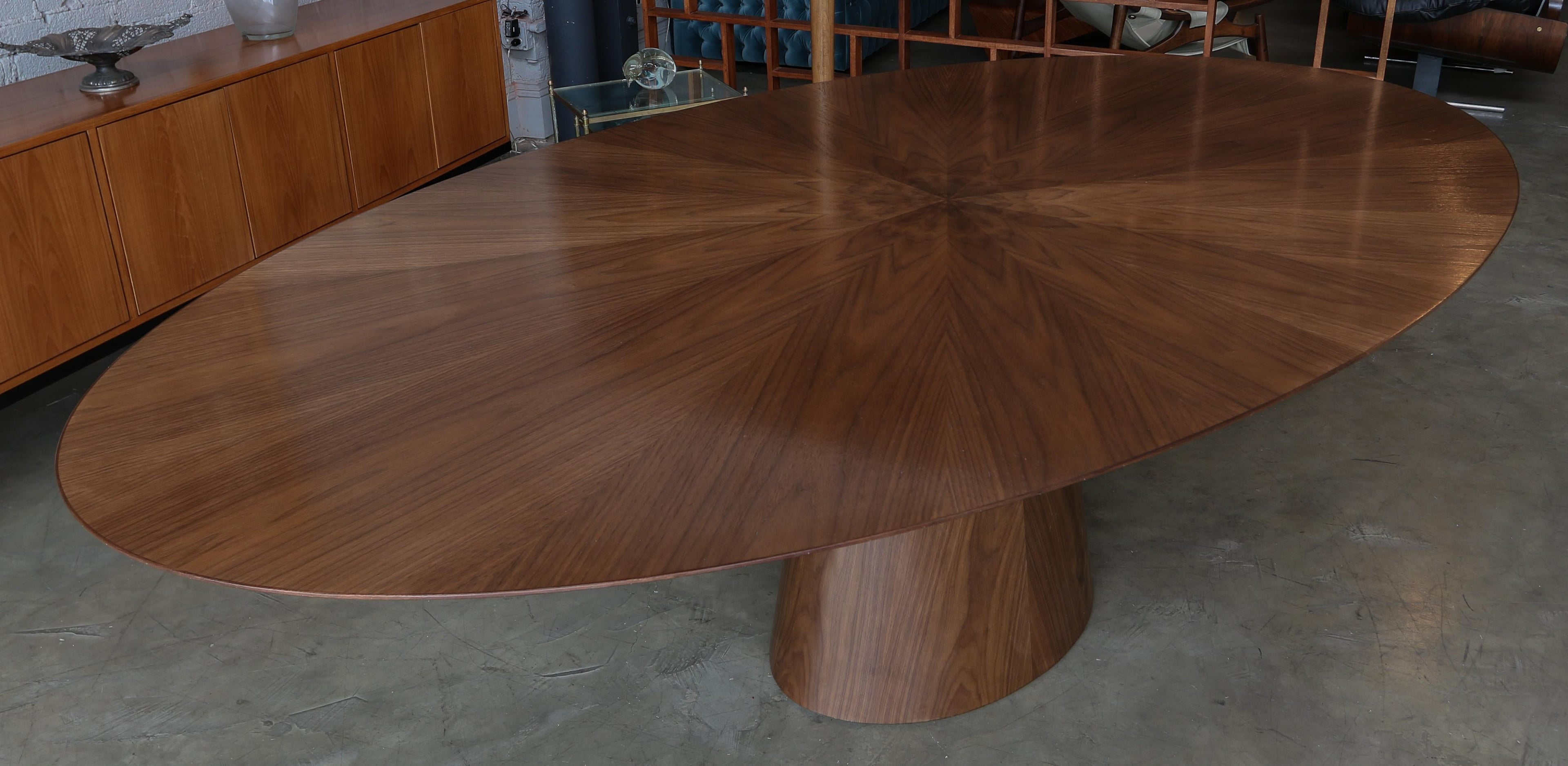 https://a.1stdibscdn.com/custom-midcentury-style-walnut-oval-dining-table-with-flower-detail-by-adesso-for-sale-picture-4/f_8175/f_463233421755550407755/T_418_6_master.jpg