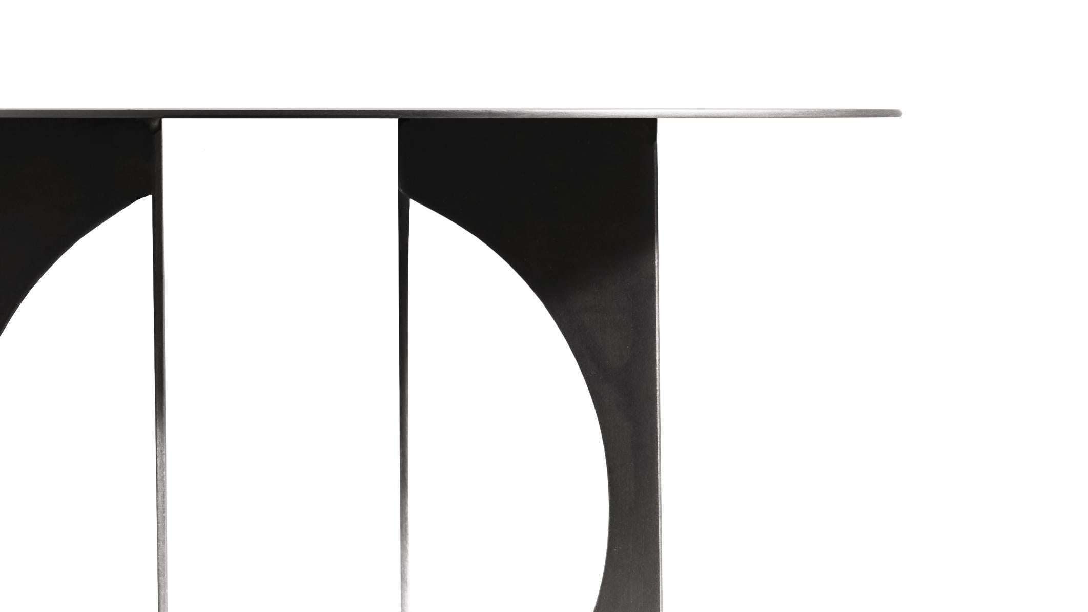https://a.1stdibscdn.com/art-deco-sphere-cut-out-table-in-blackened-steel-finish-for-sale-picture-3/f_54542/f_208226121614621017991/TableModel2_2crop_master.jpg