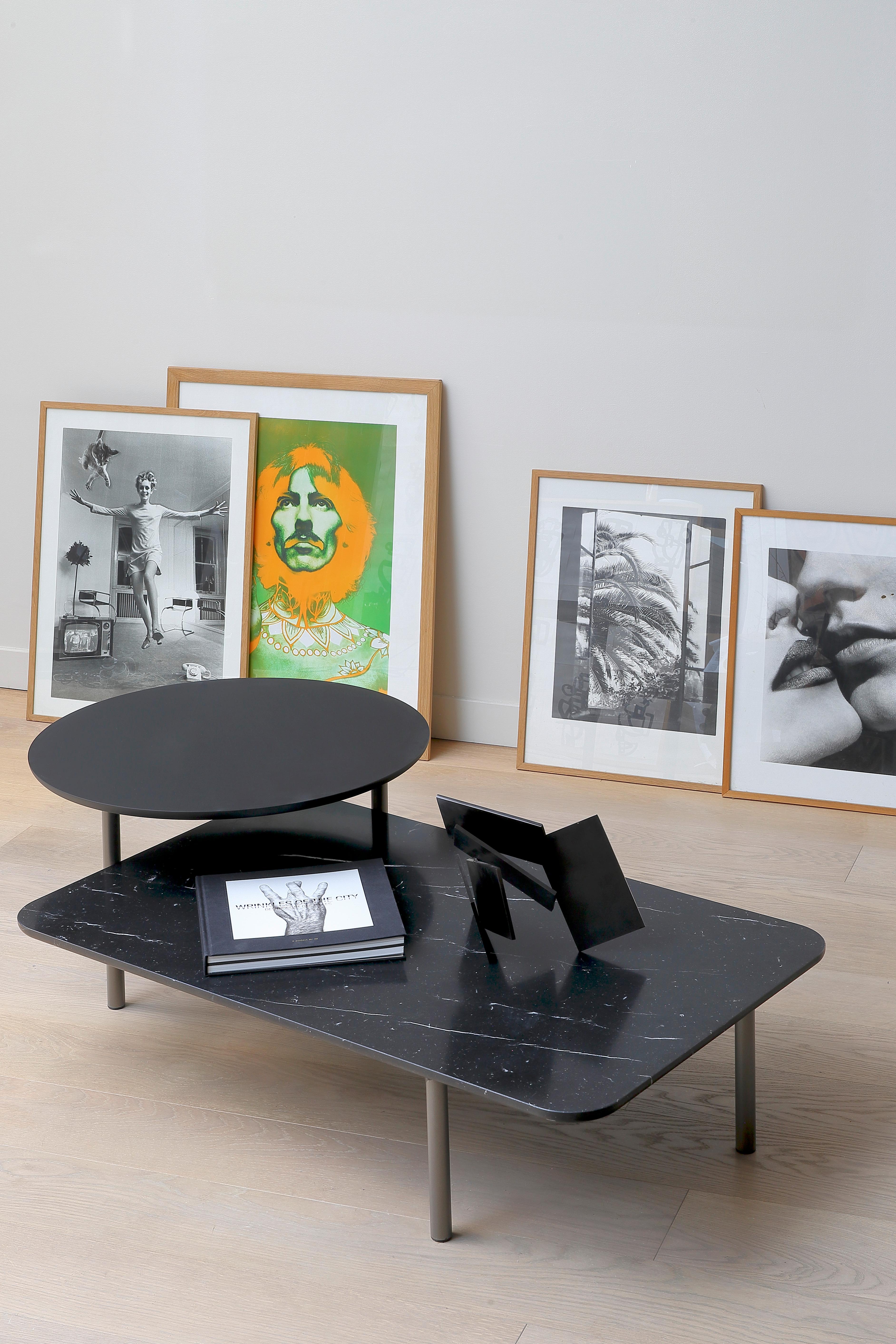 https://a.1stdibscdn.com/nero-marble-bitop-coffee-table-by-rodolfo-dordoni-for-sale-picture-6/f_12192/f_318559021671626555100/Table_BITOP_PA2_marbre_1__master.jpg
