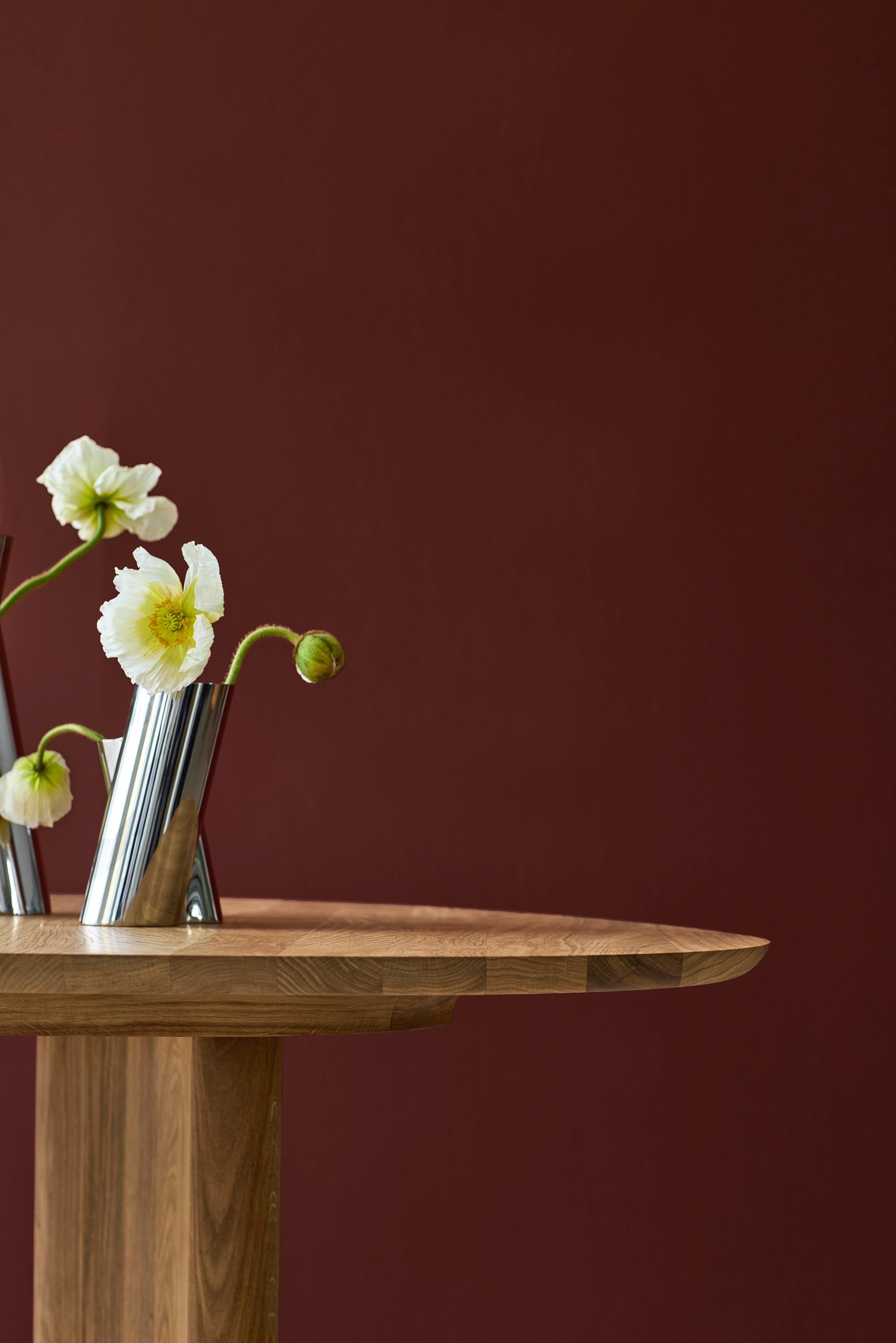 https://a.1stdibscdn.com/contemporary-round-dining-table-tangent-by-anne-boysen-x-dk3-soap-oak-for-sale-picture-12/f_31233/f_456067421750860879194/Tangent_Table_Round_oak_oil_red_background_low_master.jpg