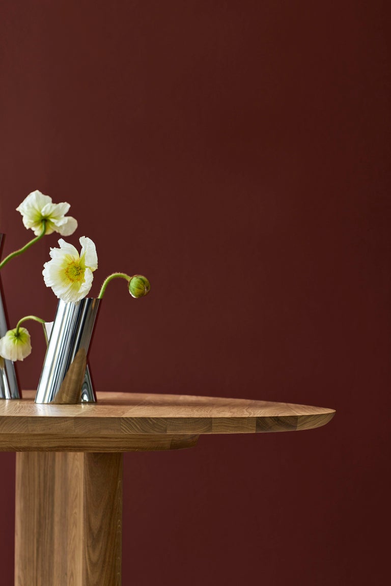 https://a.1stdibscdn.com/contemporary-round-dining-table-tangent-by-anne-boysen-x-dk3-smoked-oak-for-sale-picture-11/f_31233/f_456020021750847312682/Tangent_Table_Round_oak_oil_red_background_low_master.jpg?width=768