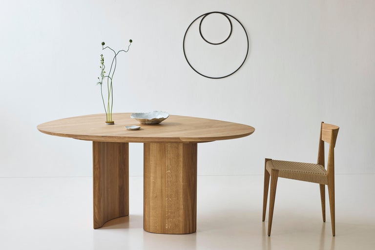 https://a.1stdibscdn.com/contemporary-round-dining-table-tangent-by-anne-boysen-x-dk3-lacquered-walnut-for-sale-picture-11/f_31233/f_456036121750852352307/Tangent_Table_oak_oil_Pia_Chair_oak_oil_2_low_master.jpg?width=768