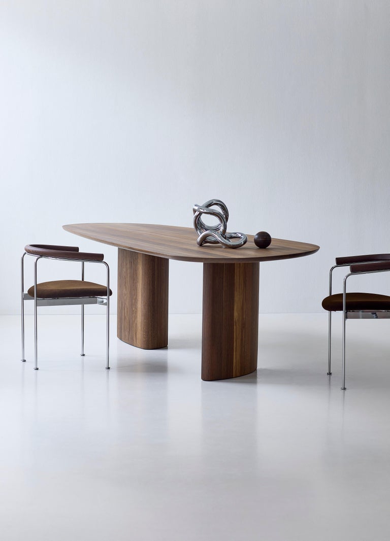 https://a.1stdibscdn.com/contemporary-rectangular-dining-table-tangent-by-dk3-oiled-white-oak-270-cm-for-sale-picture-9/f_31233/f_458107521752143465469/Tangent_Table_rect_smoked_oak_Baia_Chair_Alpaca602_chrome_1_low_master.jpg?width=768