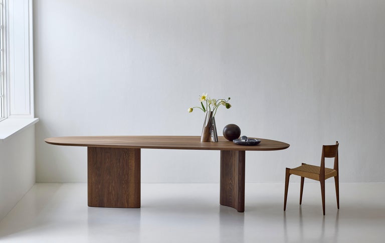 https://a.1stdibscdn.com/contemporary-rectangular-dining-table-tangent-by-dk3-oiled-white-oak-270-cm-for-sale-picture-10/f_31233/f_458107521752143465893/Tangent_Table_rect_smoked_oak_Pia_Chair_smoked_oak_low_master.jpg?width=768